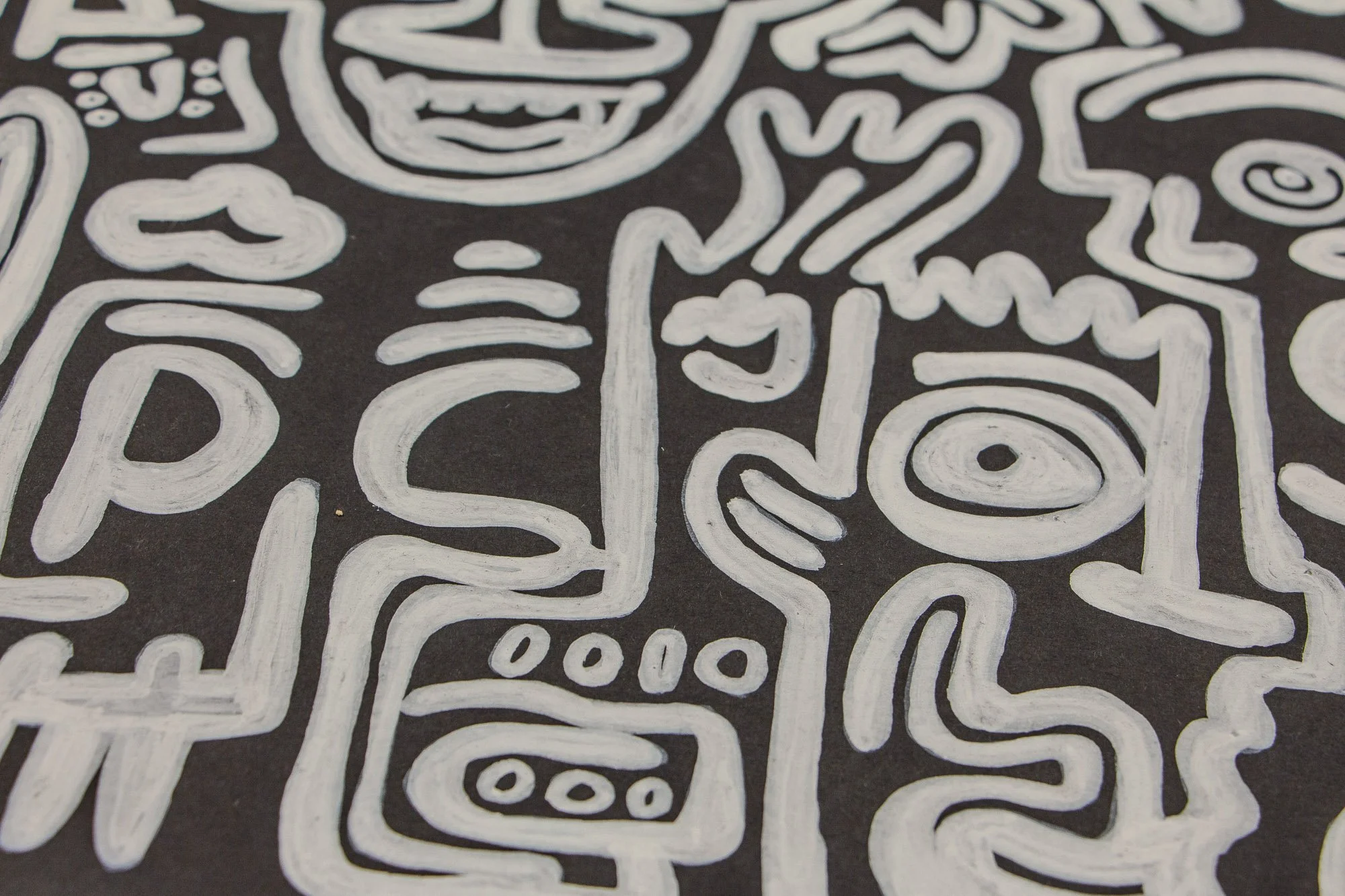 Turbulent Aegis 001 artwork detail: close-up of white line work on a dark ground, centering a stylized face and adjacent symbolic forms that balance vulnerability, tension, and rhythm.