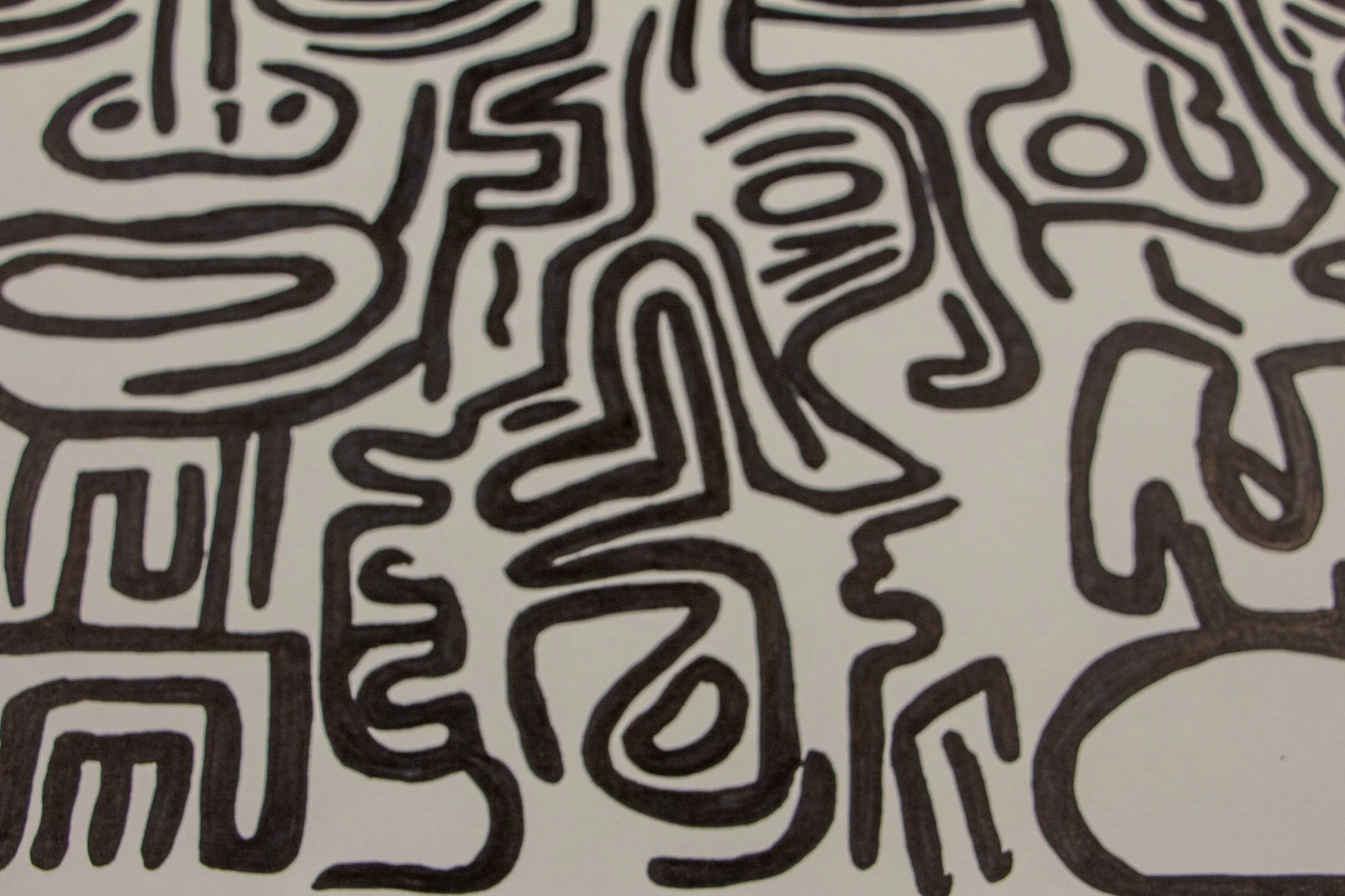 Mêlée of Discovery 002 detail: cropped study of stacked forms and facial fragments, highlighting the work’s compressed energy and the way identity seems to shift from one contour into the next.