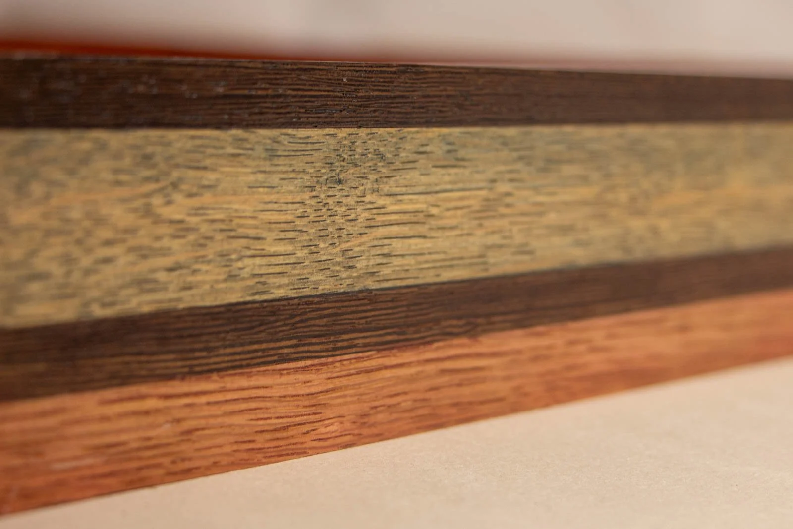 Silence’s Caesura 003 frame: oblique run, tiered rails read as even stripes; crisp alignment along the length