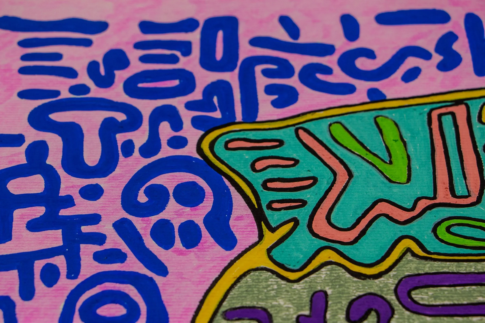 Unseen Signifiers 007 detail: close-up of the pink field filled with blue symbols beside a turquoise, yellow-outlined shape extending from the olive-green central figure.