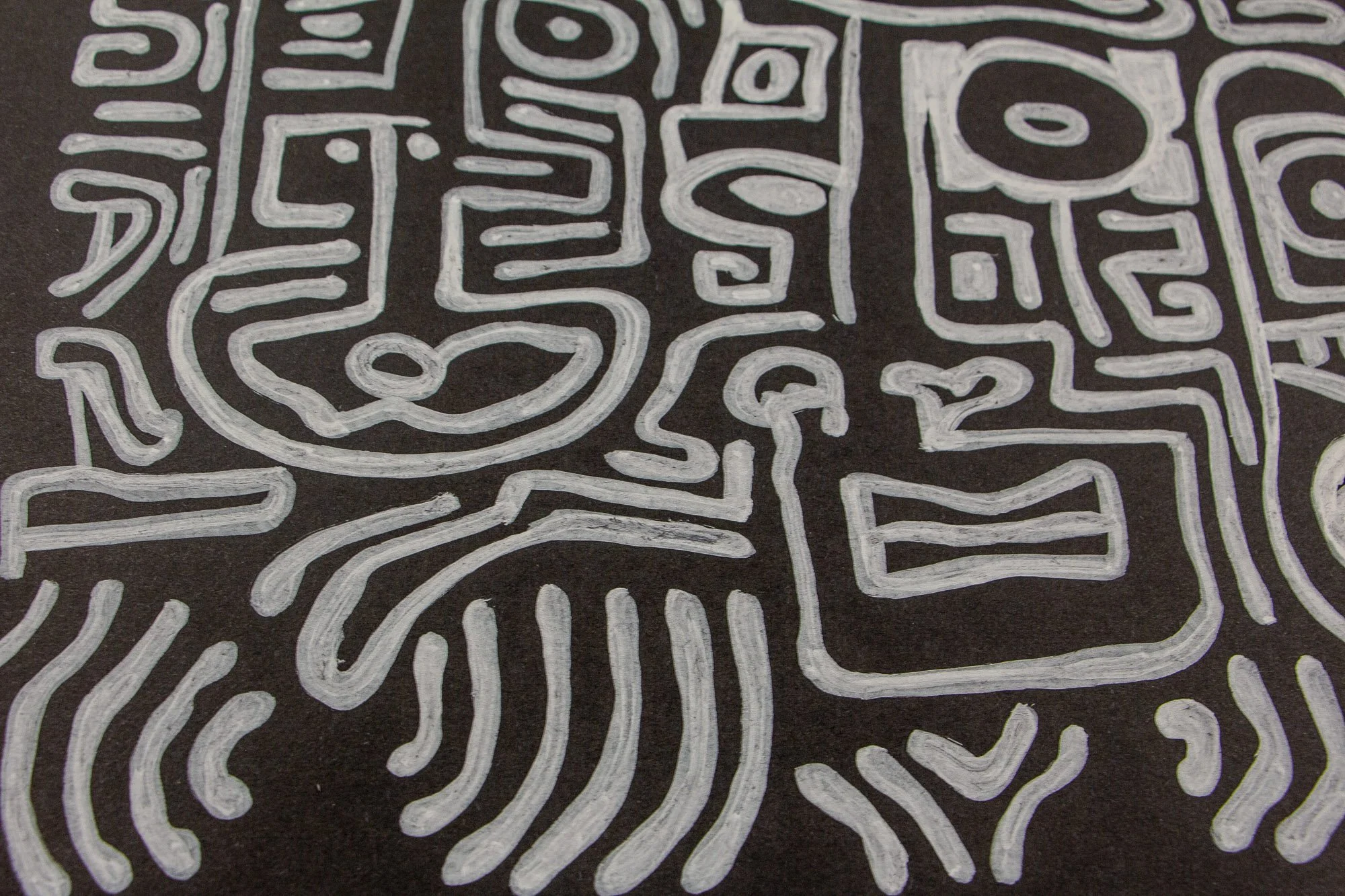 Mêlée of Discovery 003 detail: angled surface view of the composition, showing how elongated forms, repeated eyes, and vertical contours flow across the black background.