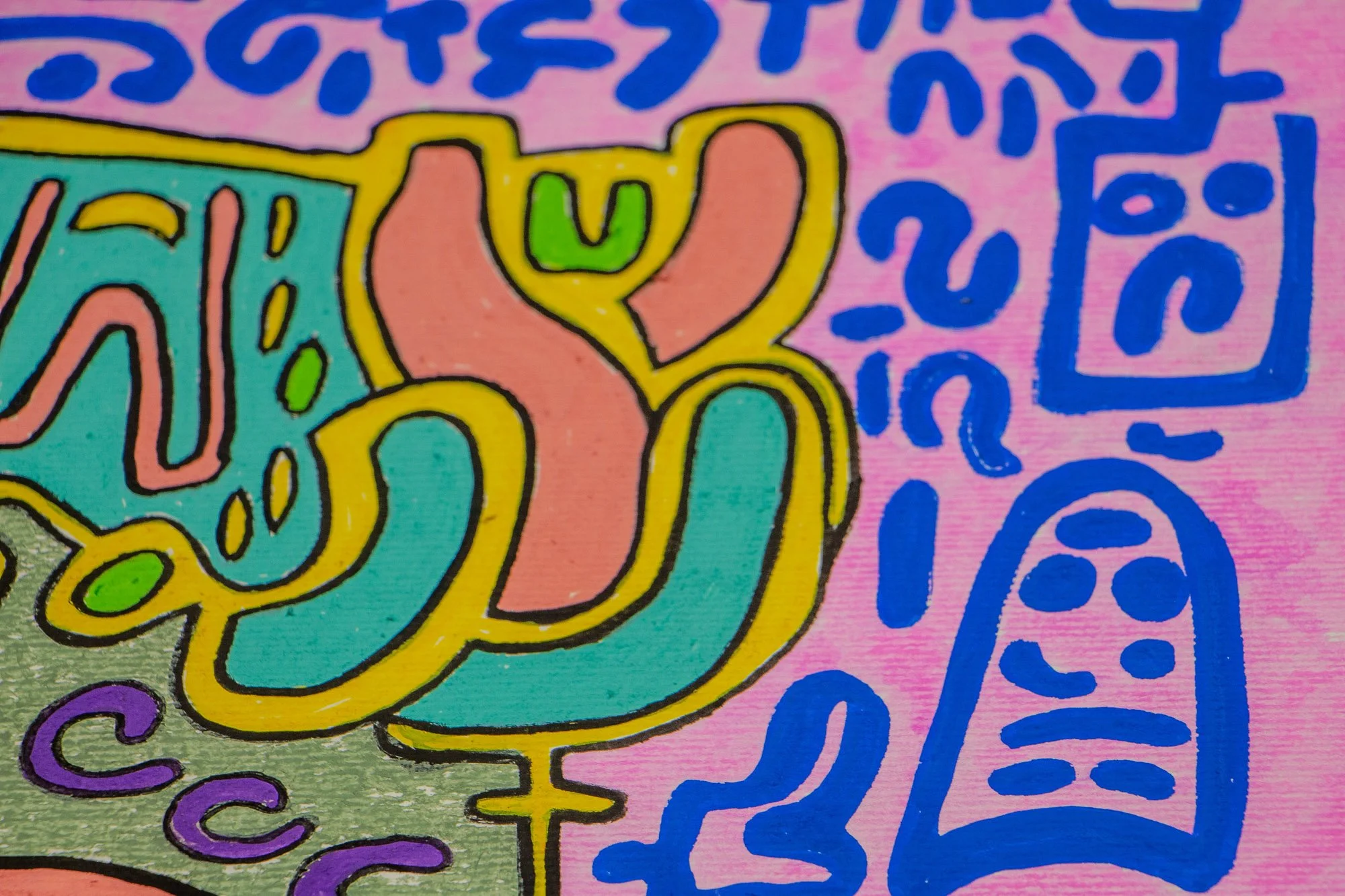 Unseen Signifiers 007 detail: close-up of a peach-and-turquoise side form outlined in yellow, set against the pink background with blue symbolic marks and a blue face-like figure.