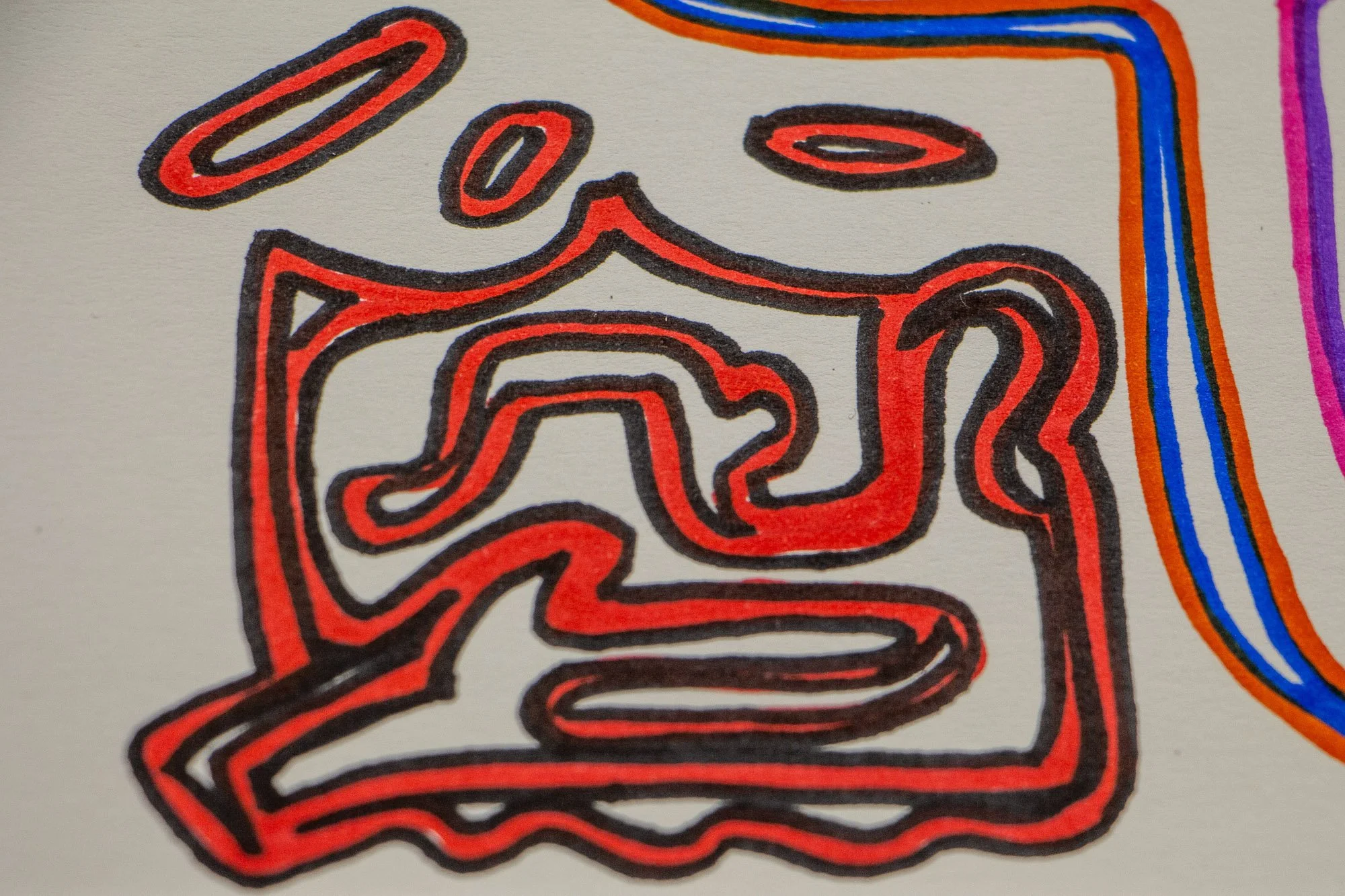 Eclipsing Gravitas 003 detail: macro of a compact red abstract form with nested contour lines and two floating oval marks above, emphasizing the layered marker lines and graphic density of the composition.