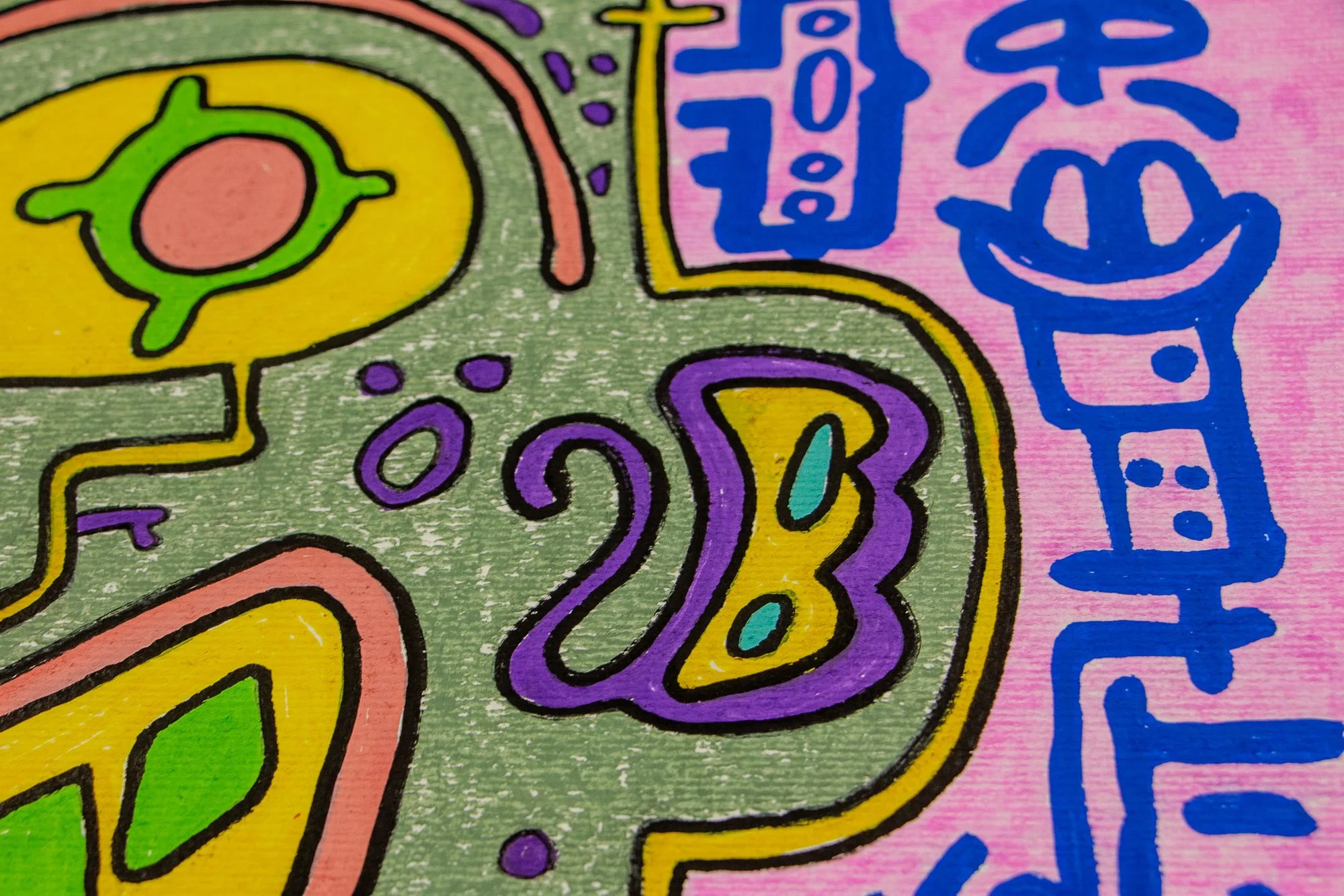 Unseen Signifiers 007 detail: close-up of the right side of the face, showing a purple-and-yellow side motif within the olive-green field beside bold blue symbols on the pink background.