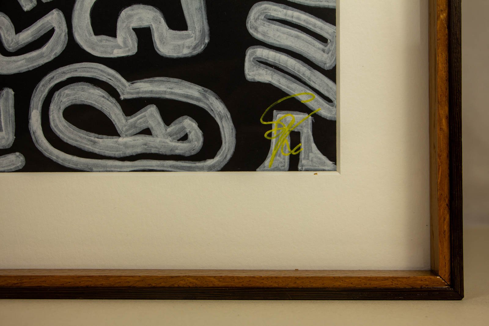 Metamorphic Entwining 004 frame: front right lower corner with yellow signature; off-white mount and sharp window cut