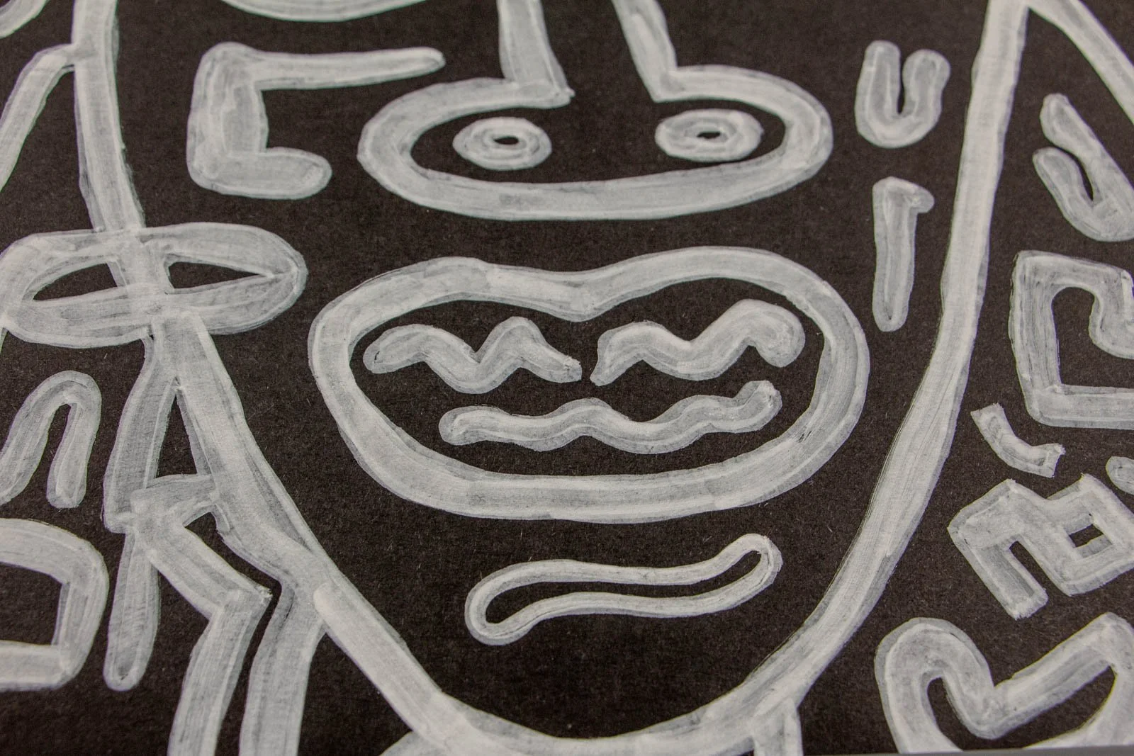 Metamorphic Entwining 004 detail: close on the mouth, two wavy bars within rounded lips, with a small underline mark below; feathered edges reveal layered application