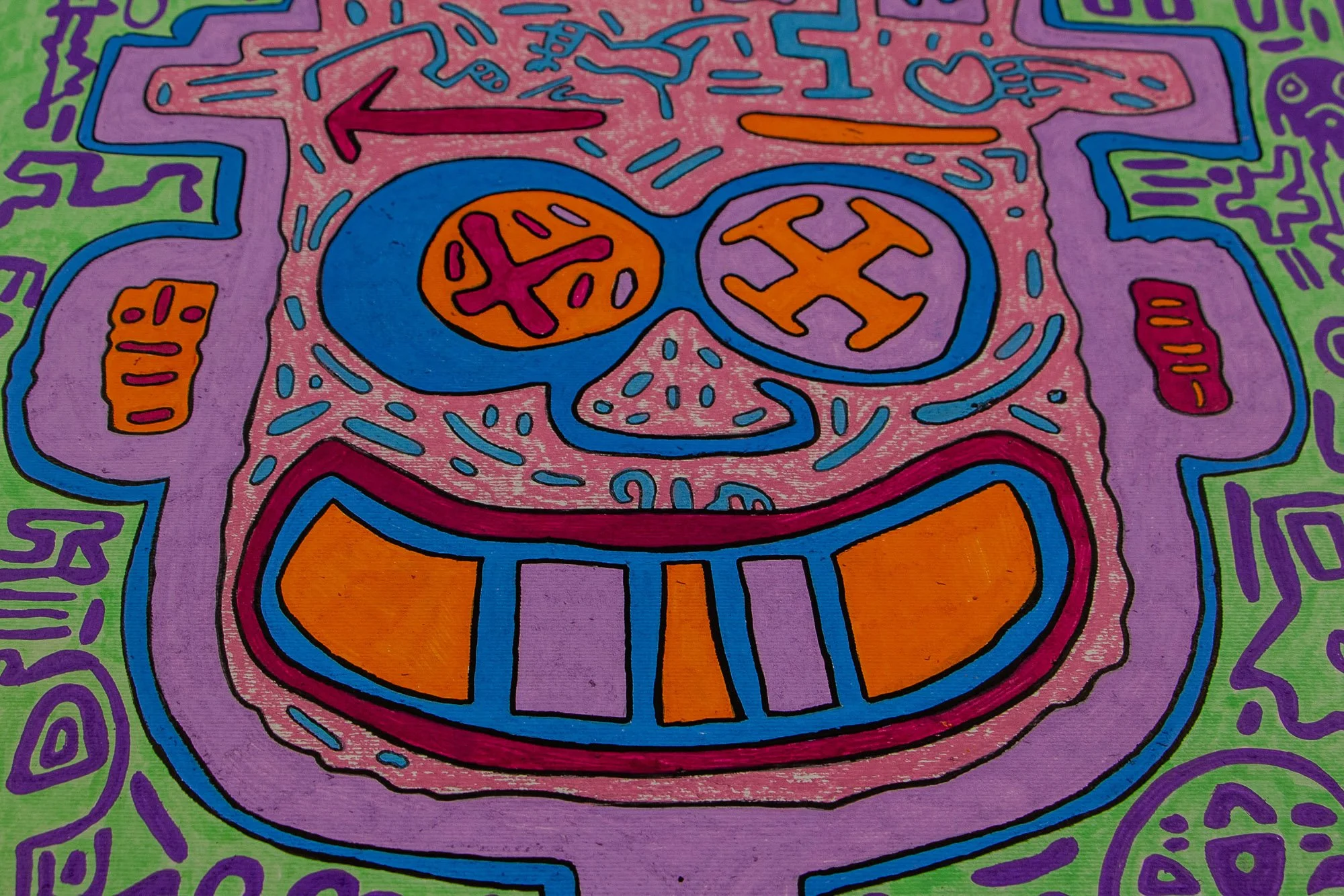 Unseen Signifiers 005 detail: frontal close-up of the central face-like figure, showing the pink head, blue eyes and nose, and broad orange-and-lilac grin against the green ground.
