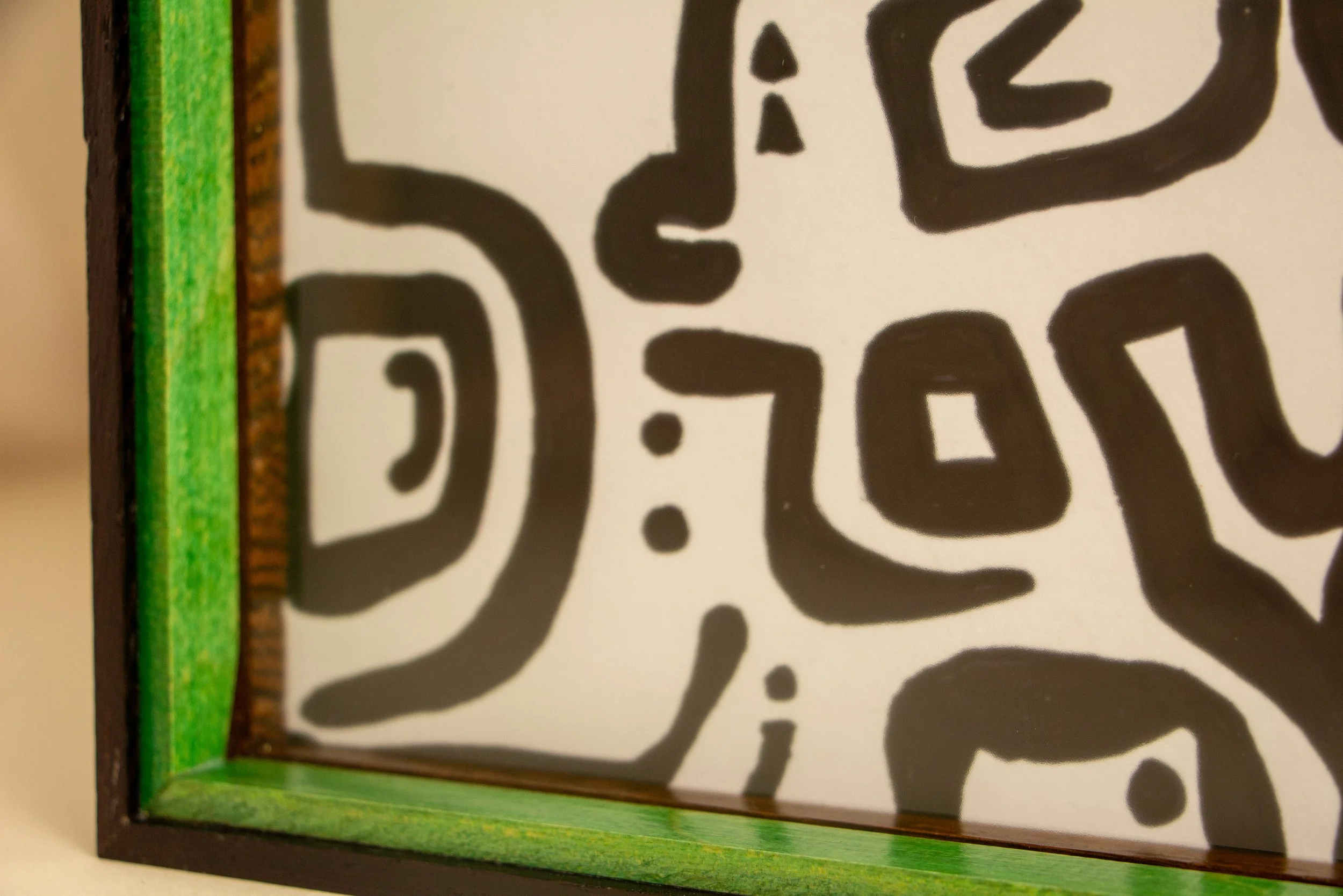 Formless Equation 001 frame: inner corner with bright green spacer/liner, clean join to the glass