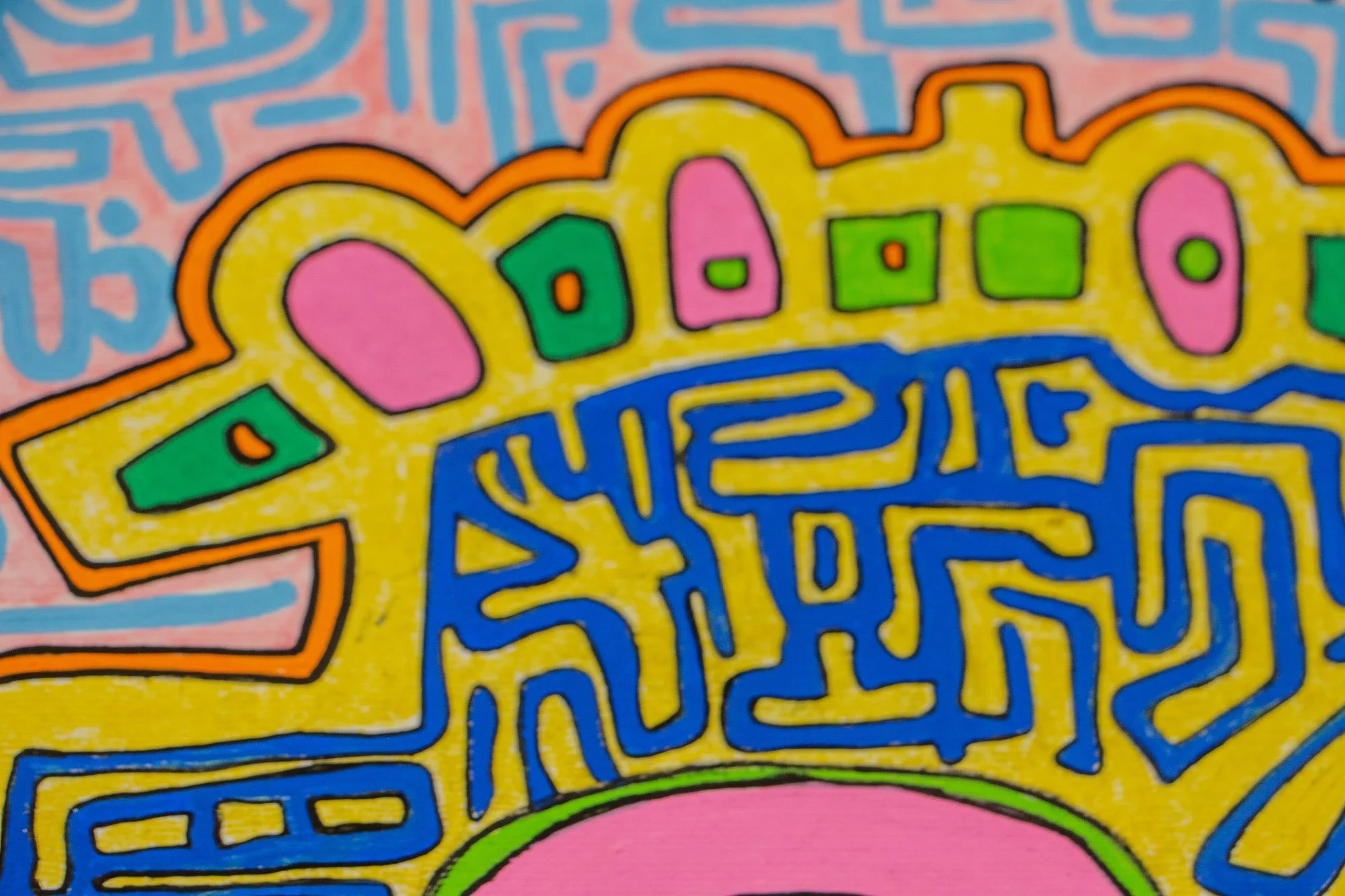 Unseen Signifiers 006 detail: upper-left close-up showing the yellow head contour, pink and green block-like forms, and dense blue labyrinth linework across the forehead.