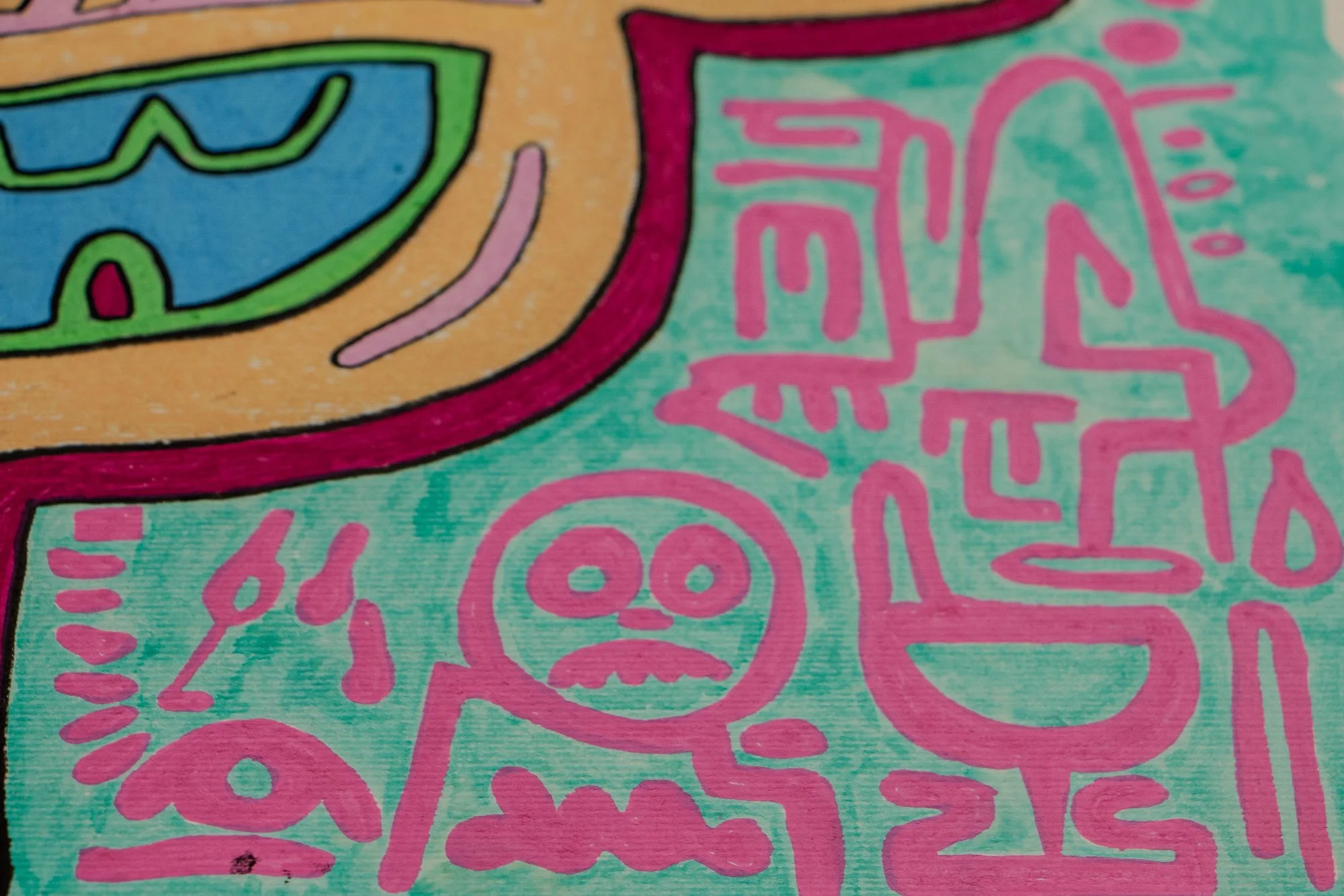 Unseen Signifiers 004 detail: lower-right symbolic cluster showing a round-headed pink figure, linear marks, and an eye-like motif beneath the side of the face.