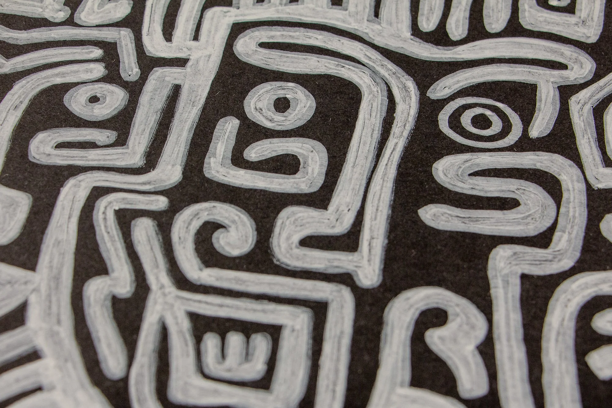 Mêlée of Discovery 005: close-up of a face-like figure with a circular eye, curled cheek line, and boxed lower motif, rendered in layered white linework on a dark ground.