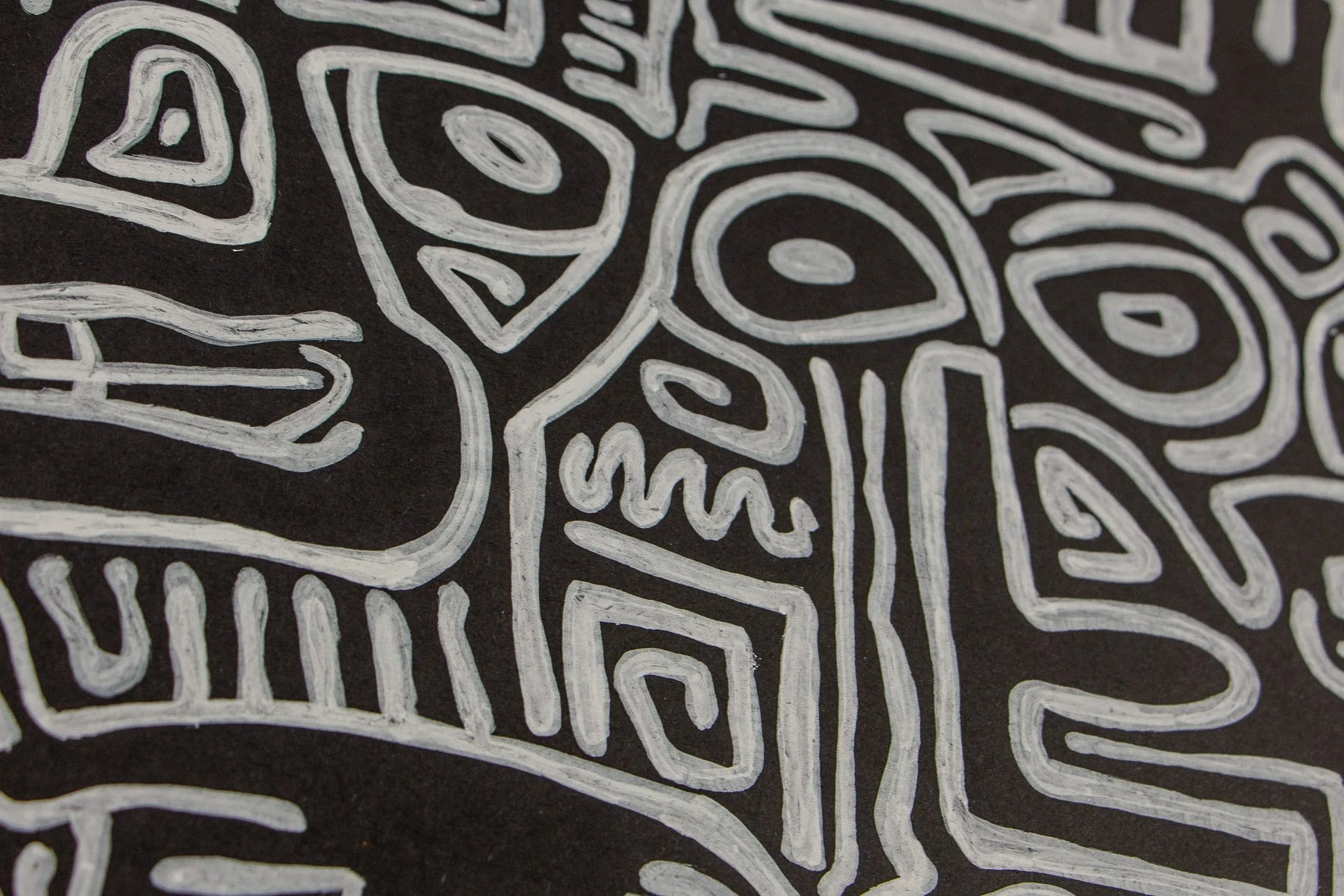 Mêlée of Discovery 003 detail: cropped study of a mask-like form with sharp internal contours, set among looping lines and adjacent fragments that suggest motion and tension.