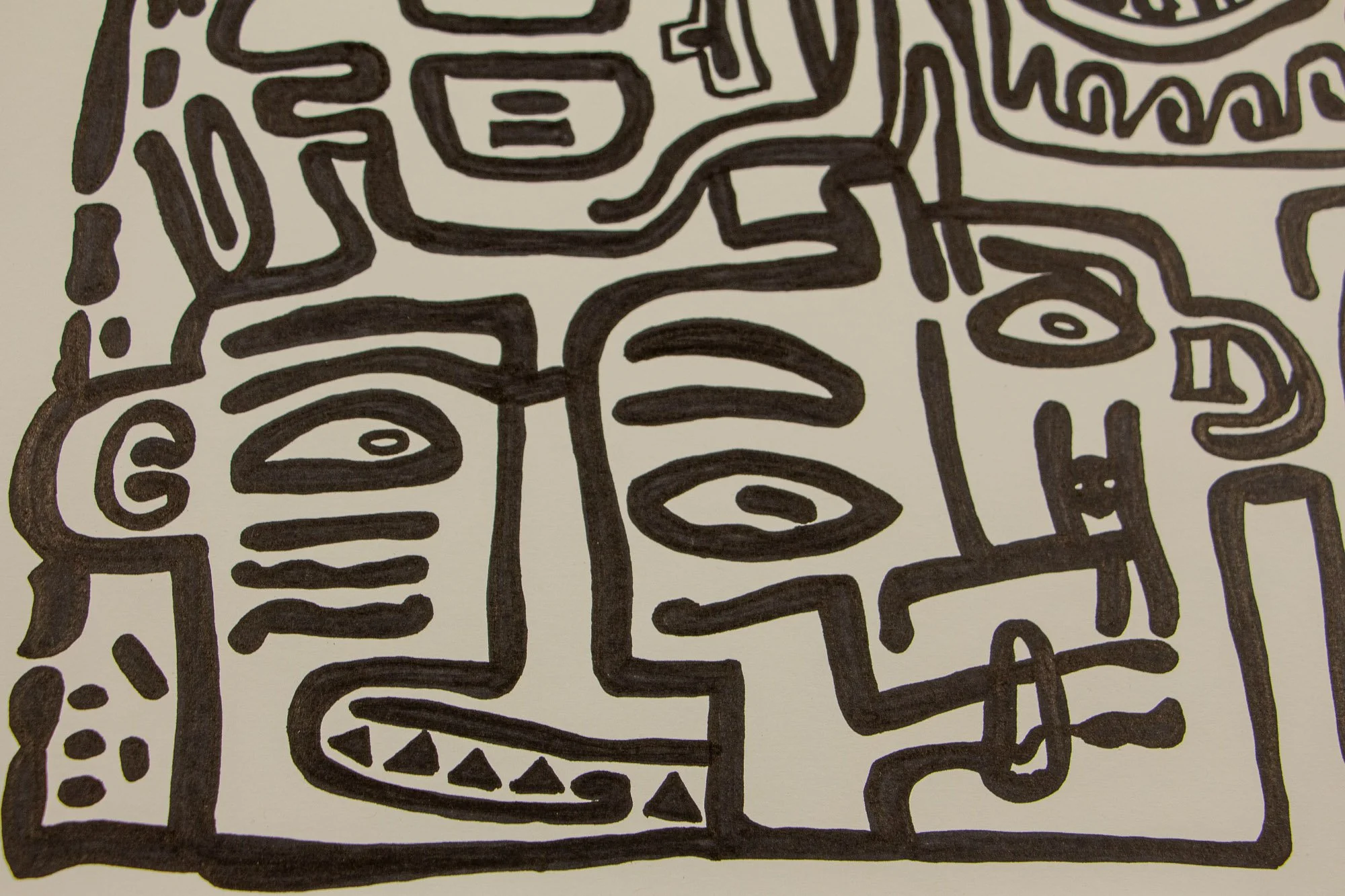 Veiled Alchemist 004 detail: close-up of a face with half-lidded eyes, striped cheek lines, and a row of triangular teeth, revealing the drawing’s mix of tension, wit, and mask-like expression.