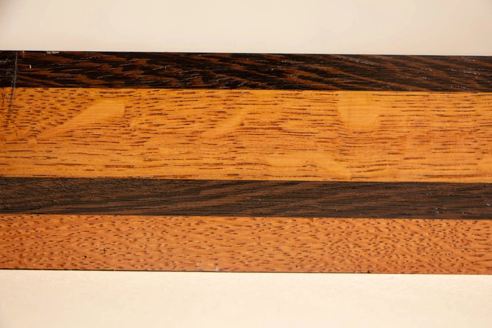 Formless Equation 003 frame: close, even view of oak field and wengé banding, pores and texture clearly visible