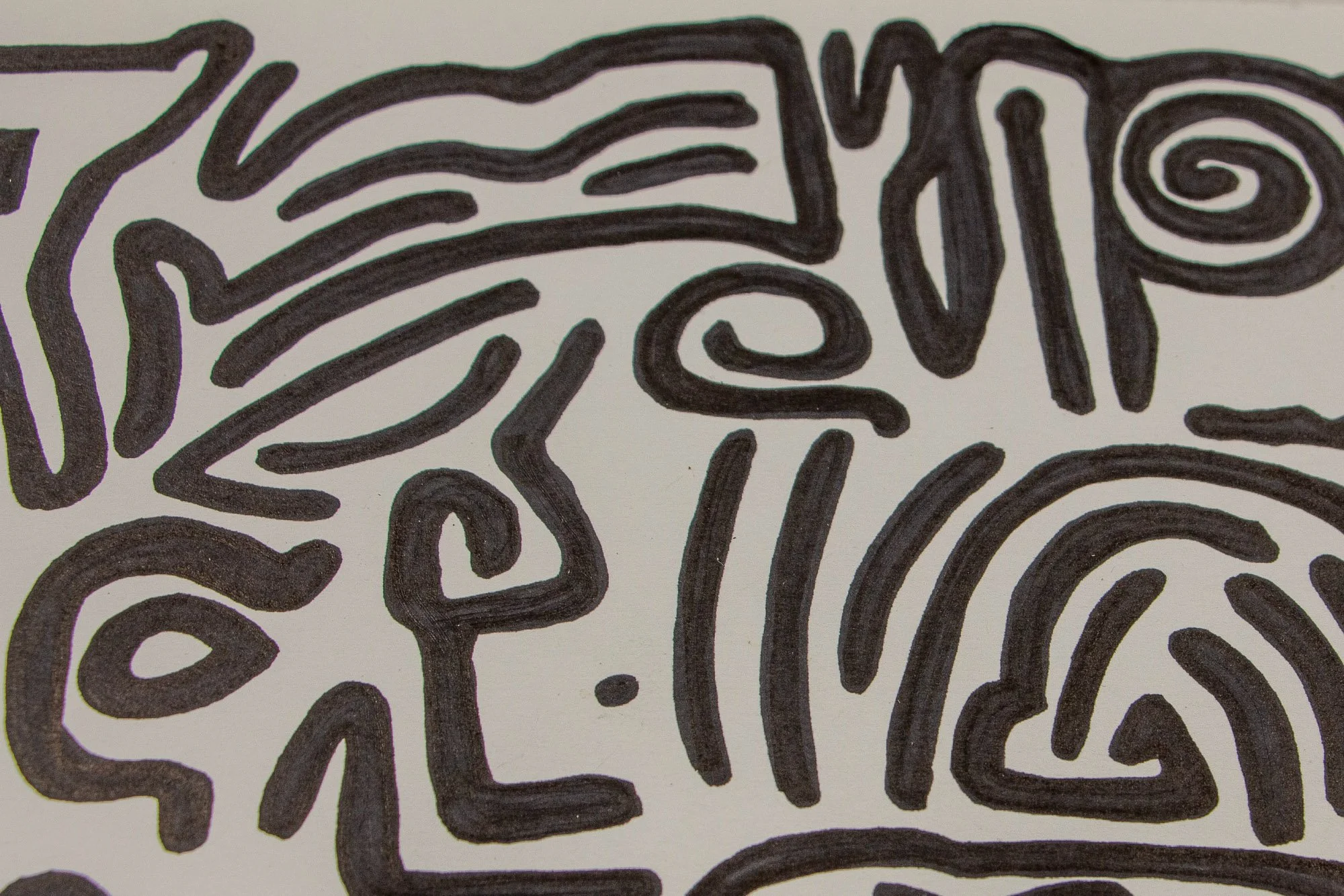 Mêlée of Discovery 002 detail: close-up of thick black linework on a light ground, where a compact cluster of symbols and facial fragments forms a tense but balanced visual knot.