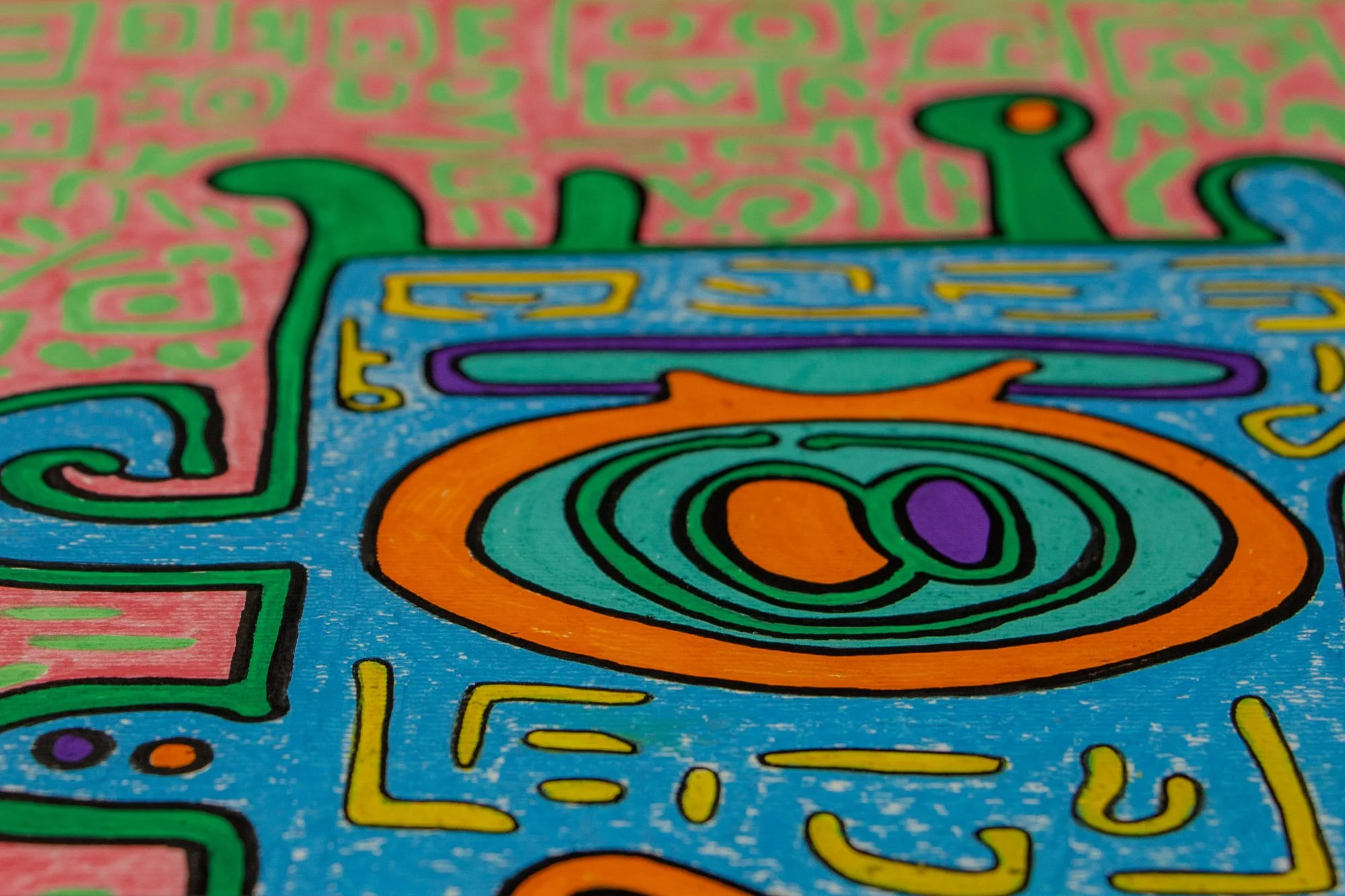 Unseen Signifiers 001 detail: angled close-up of the upper left section, focusing on the orange-rimmed eye, turquoise inner form, and the transition between the blue face and pink background.