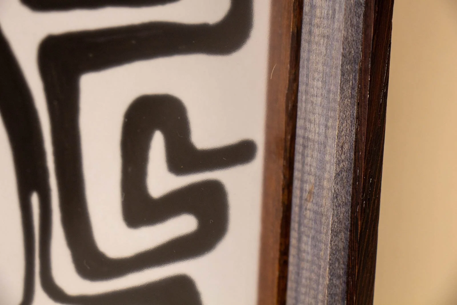 Formless Equation 003 frame: glass edge with internal spacer, soft reflection over black linework near rim