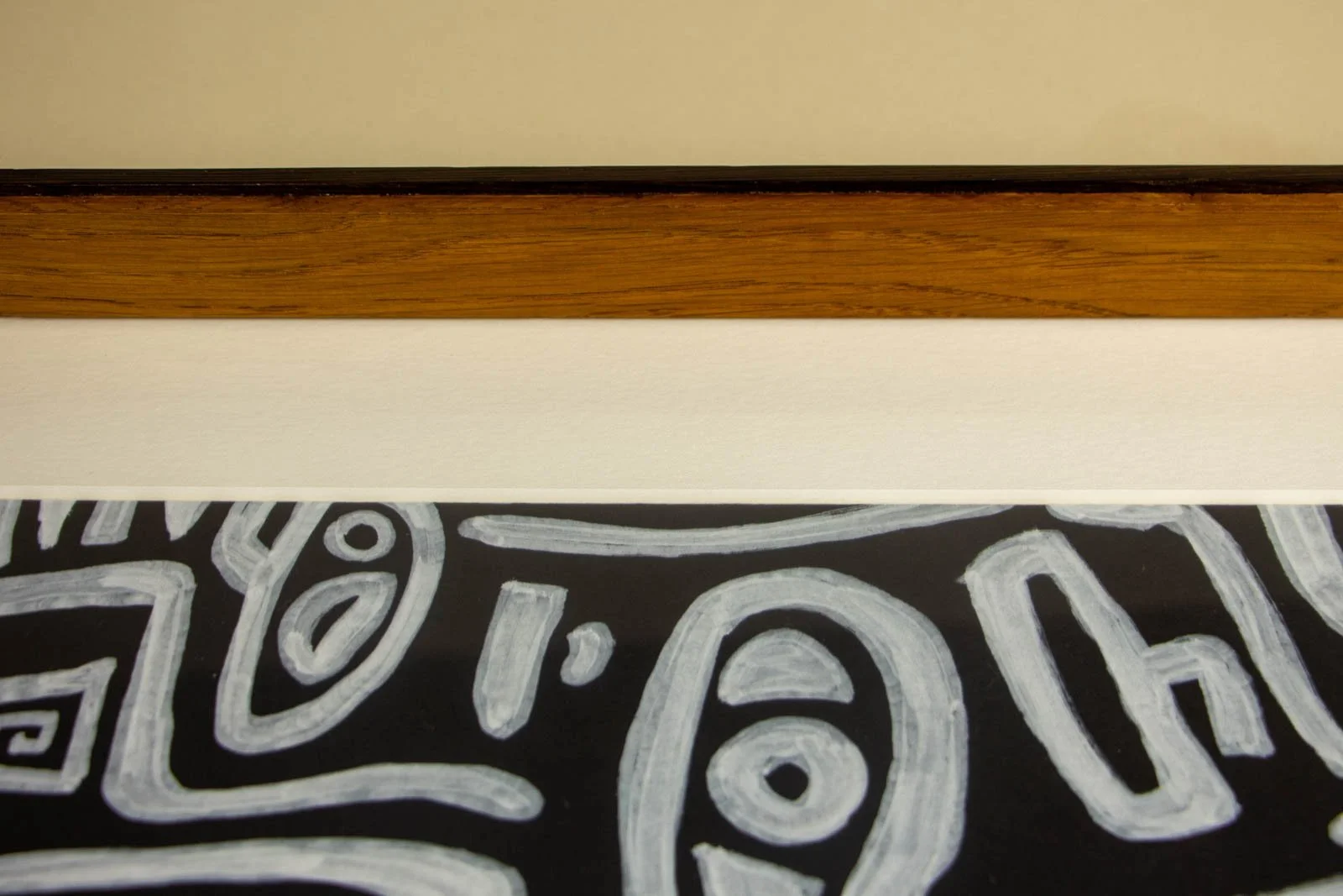 Metamorphic Entwining 004 frame: top rail and mount bevel; glazing sits snug to the frame