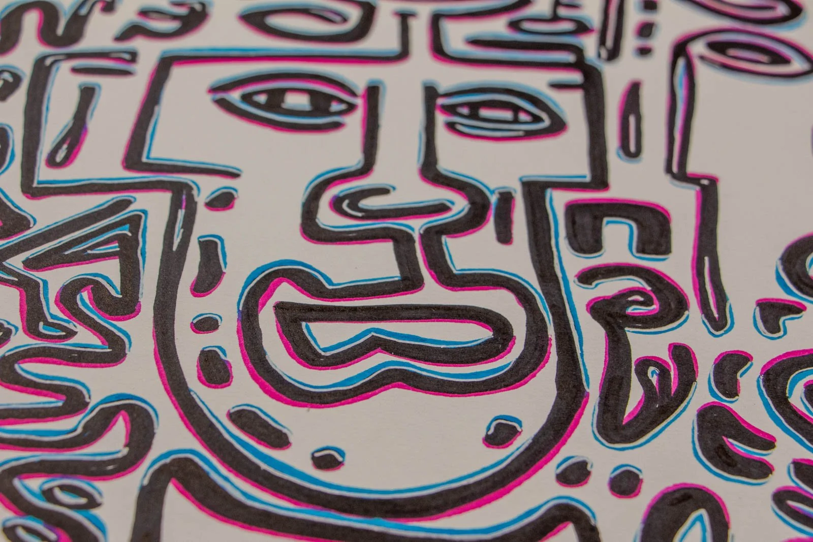 Silence’s Caesura 002 detail: square-faced mask, pill eyes, ridged lips, dotted halo; black line with light-blue underglow and a pink rim