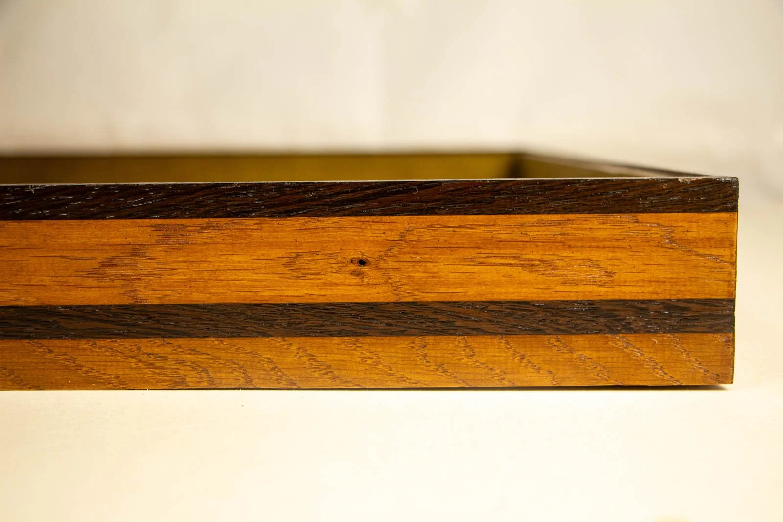 Metamorphic Entwining 003 frame: far-end side panel; banding remains straight and true into the corner