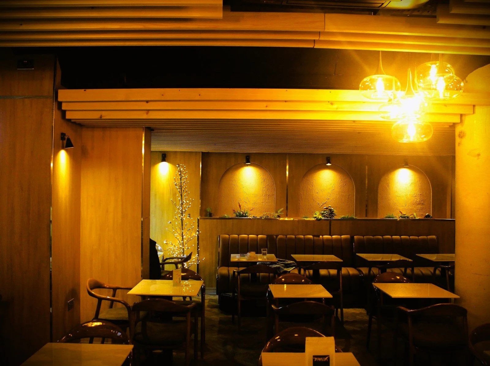 Completed Interior — View across the bar and dining area.