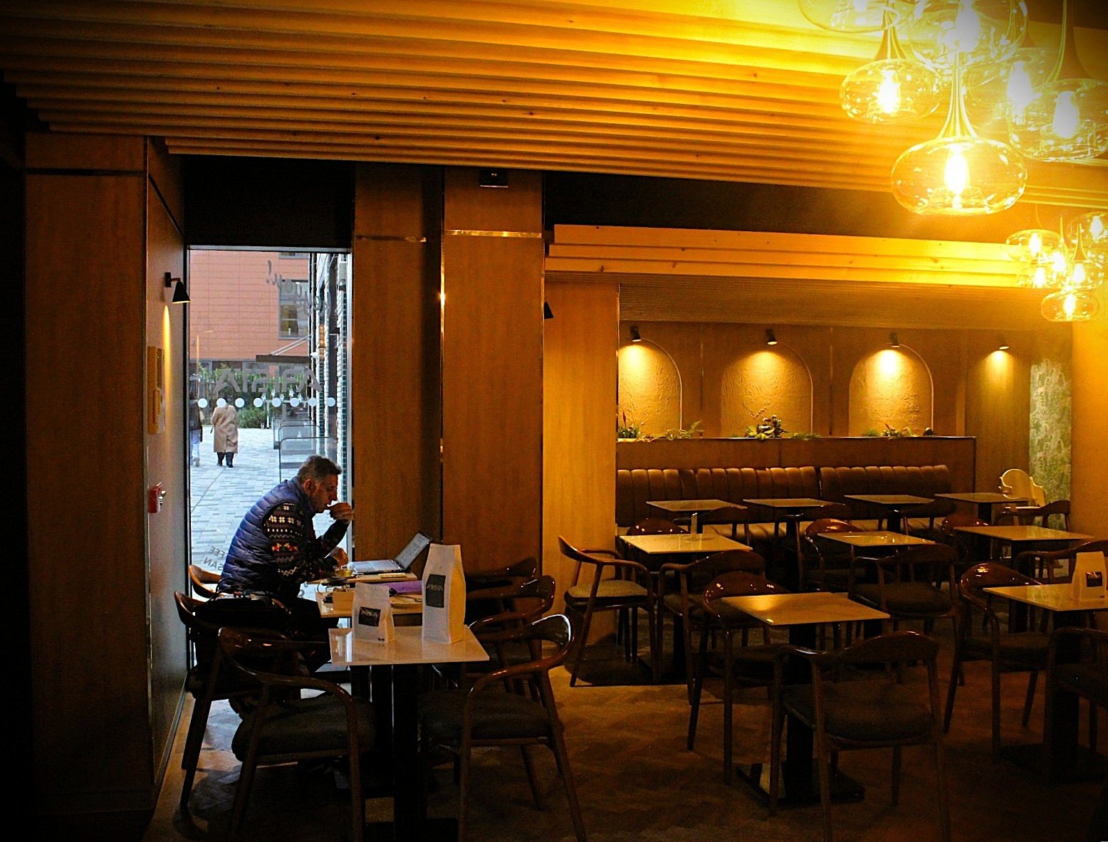 Completed Interior — Main dining area and customer seating.