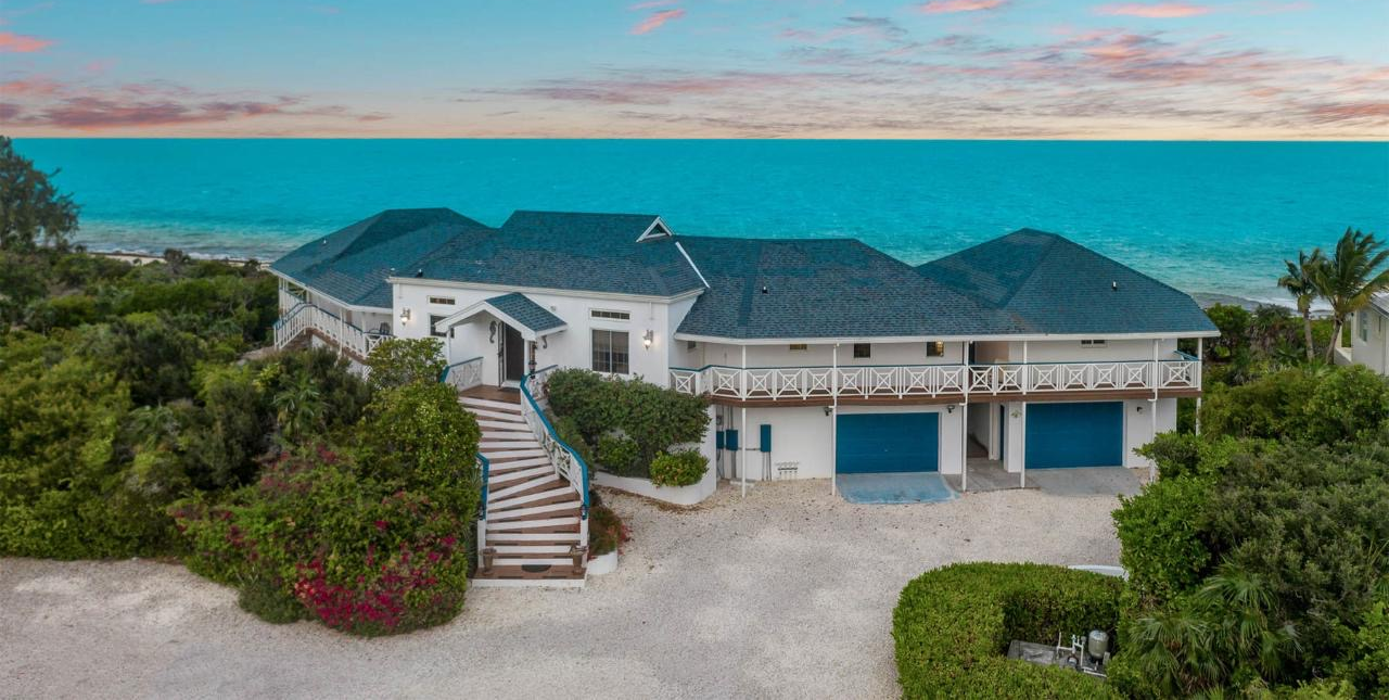 Long Bay Beach - proposed beachfront residence in Providenciales, Turks & Caicos, with shaded terraces and a swimming pool.