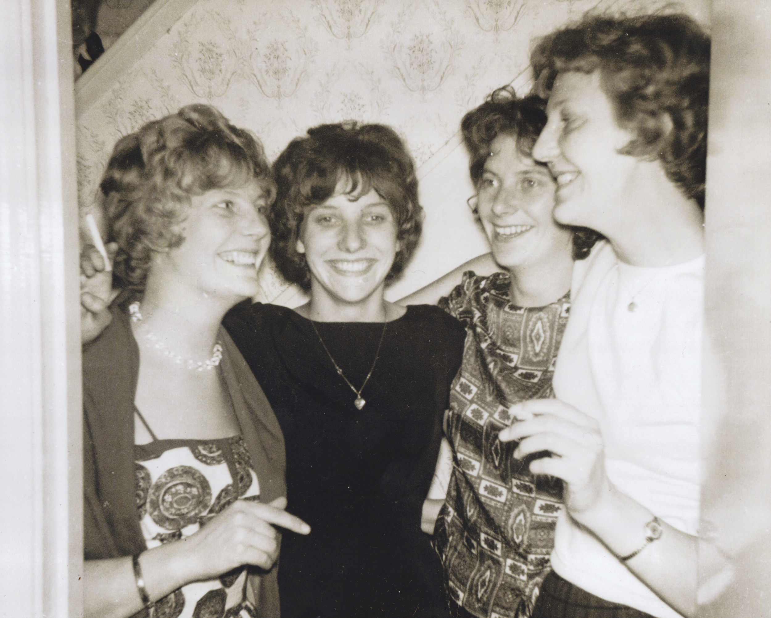 The original photograph is in good condition but carries the usual signs of age. The faces remain clear and sharp, though there is a slight softness across the image from the camera and film of the time. The exposure holds up well, but the highlights