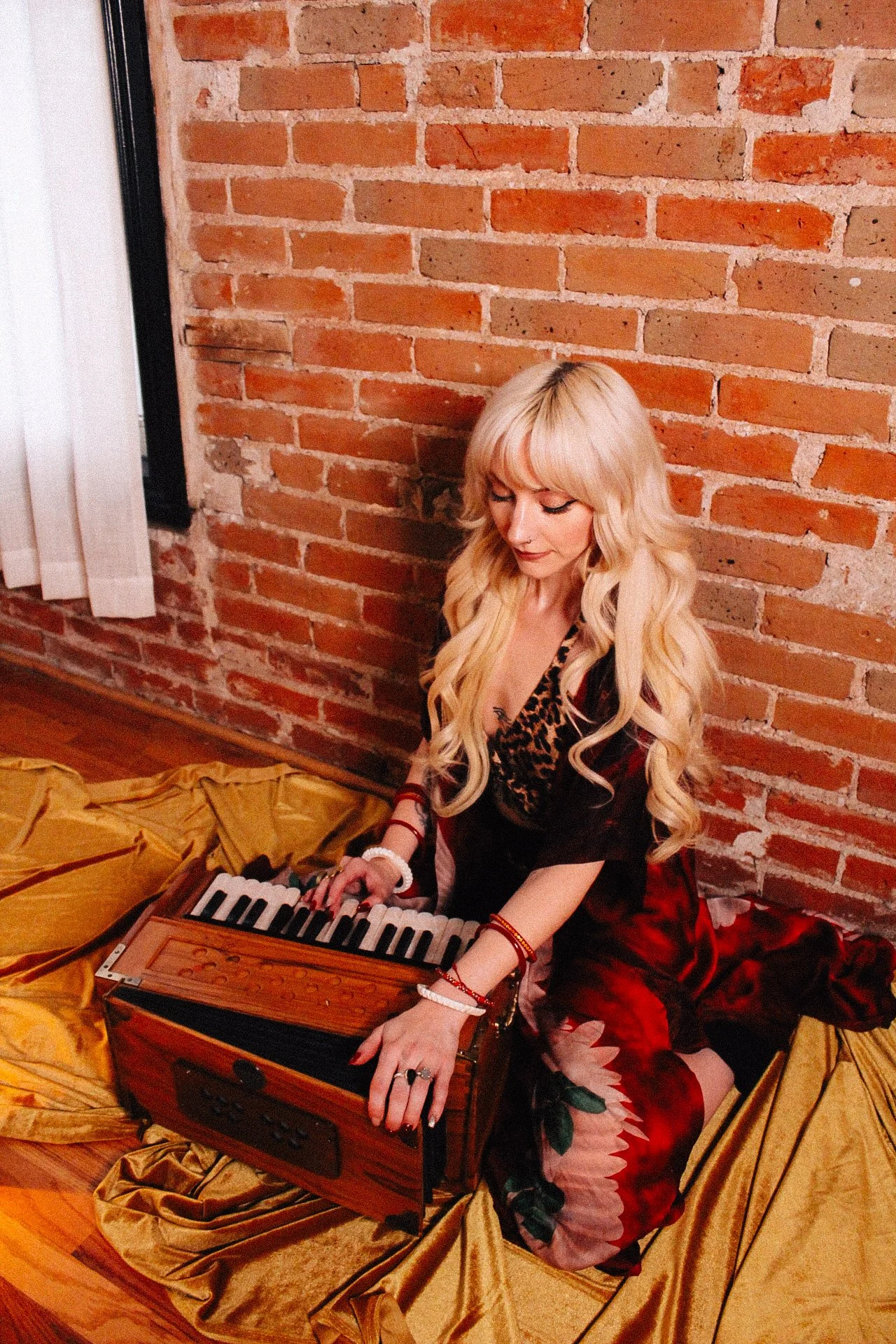 Portrait of Ruby Wolf, astrologer and spiritual teacher sharing living teachings and reflections