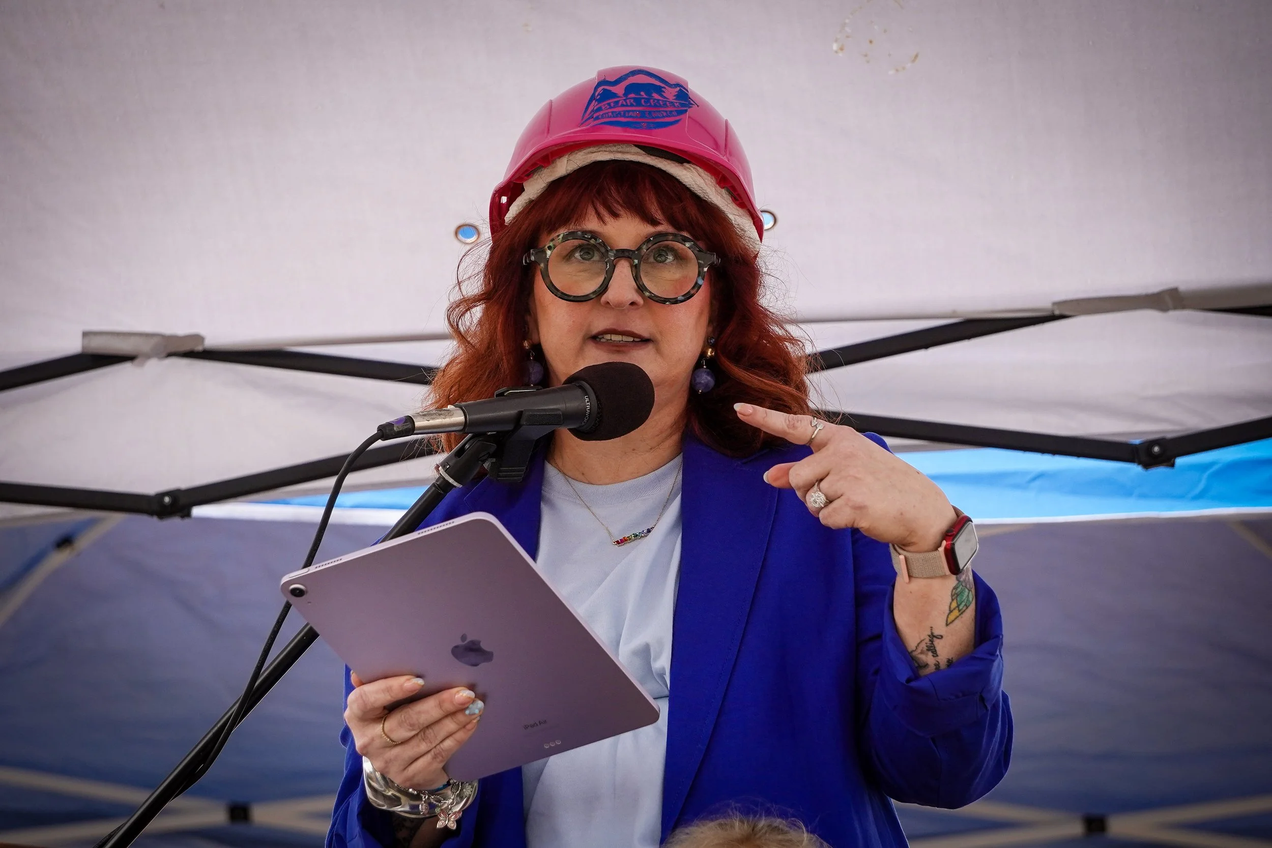 Rev. Monica Banks addressing the crowd at Bear Creek Christian Church's Groundbreaking Celebration on August 12, 2026