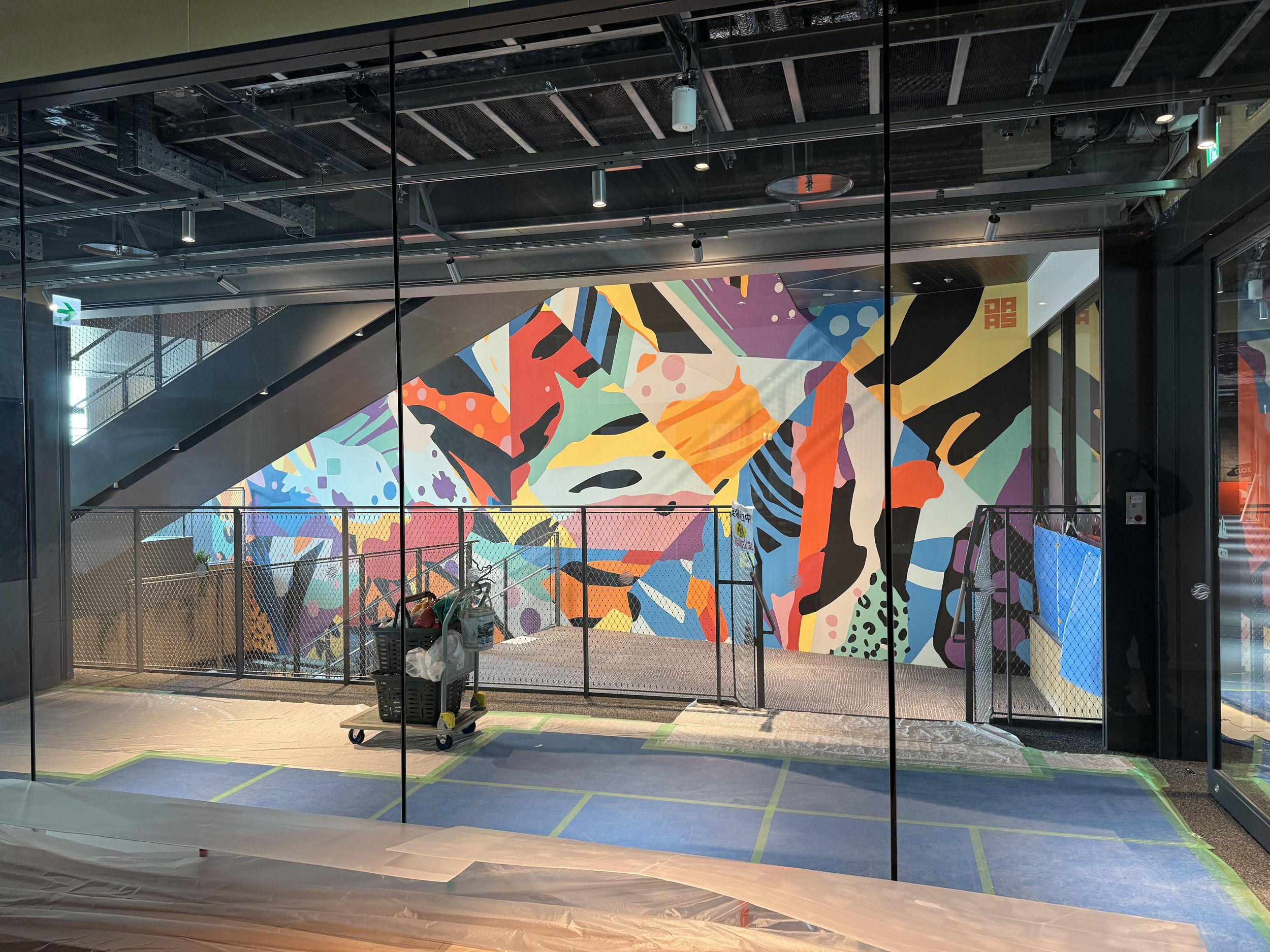 JAM BASE interior with DAAS mural installation — Grand Green Osaka Japan.JPG