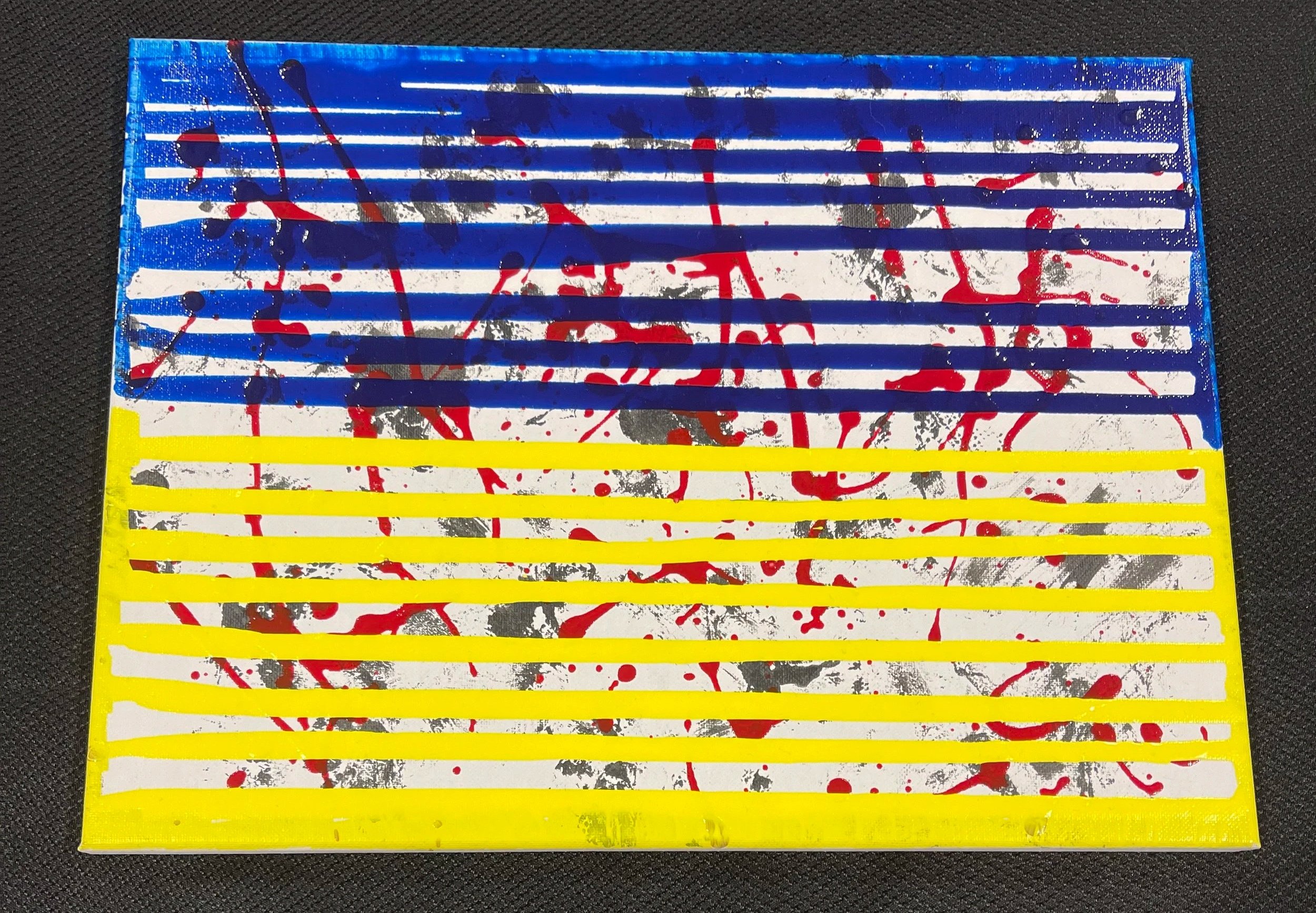 "Genocide: David vs Goliath. A story of Ukrainian resilience as the world simply watches".
The artist was ashamed as an American just watching war and its brutality being raged on the land of her ancestors and our allies. But she has never been proud