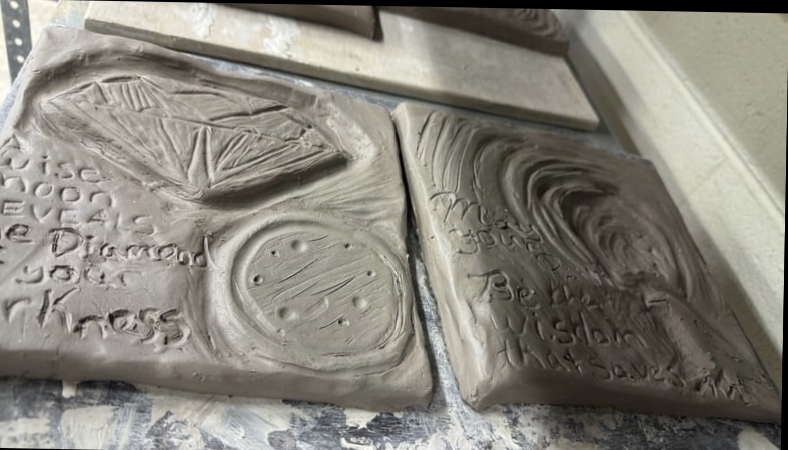 Image of two clay tiles