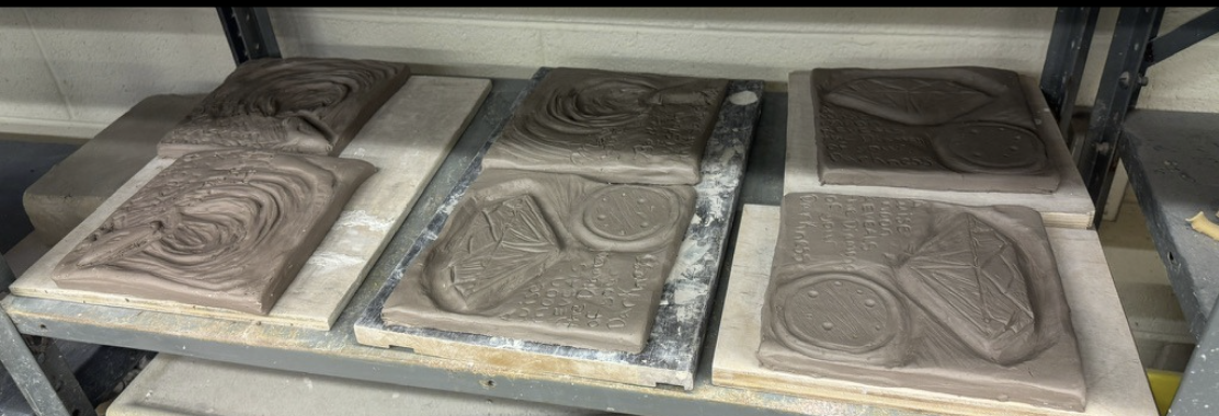 six tiles laying on a table