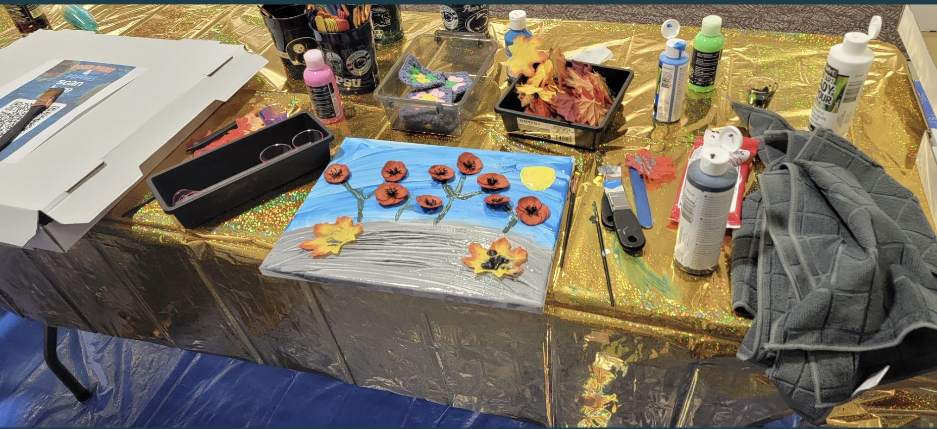 a canvas with poppies on the canvas