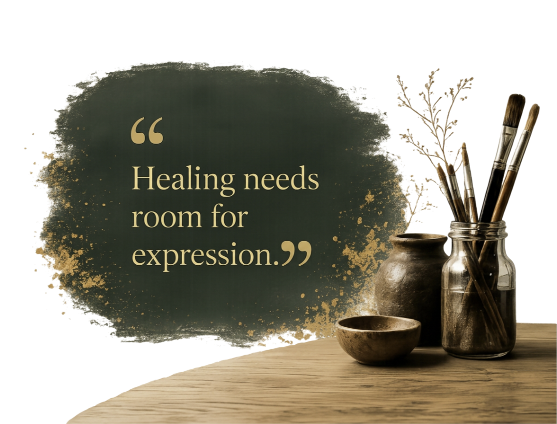 A quote on a dark green textured background reading "Healing needs room for expression." next to a wooden table with vases holding dried branches and paintbrushes.
