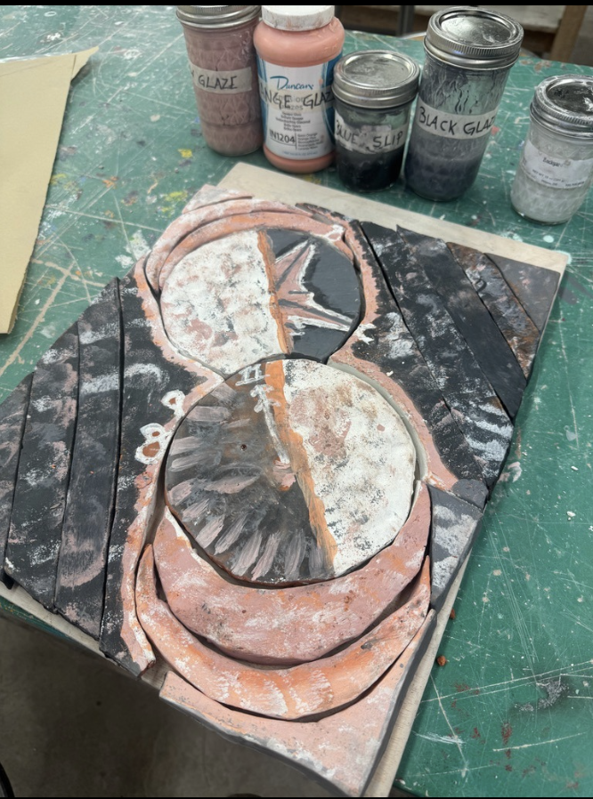 Drawn ceramic with paint bottles