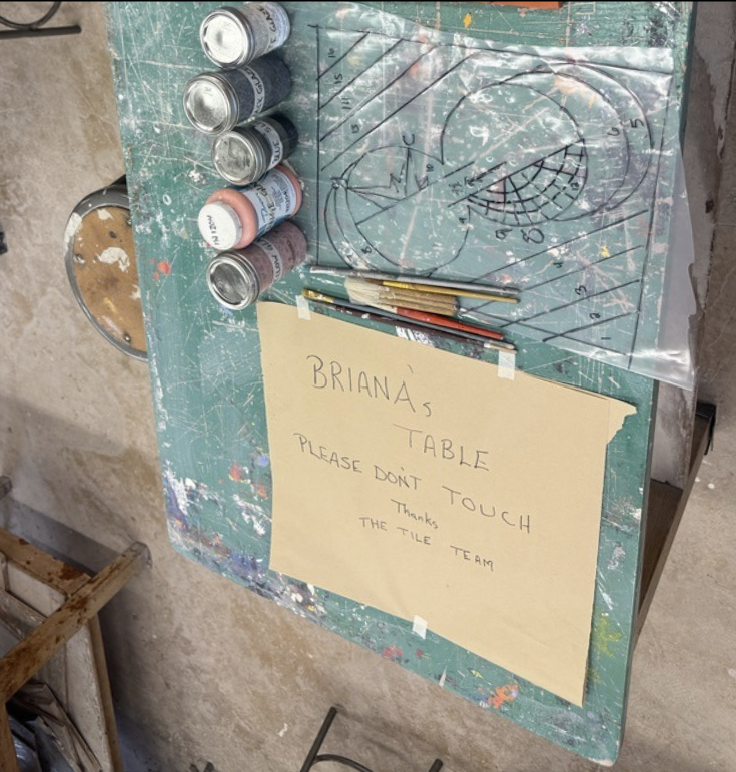 Drawing on table of what the ceramic piece will look like