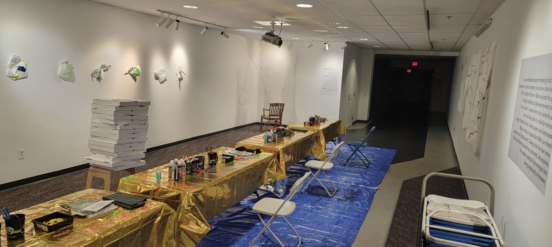 Chairs and a table with paint bottle.