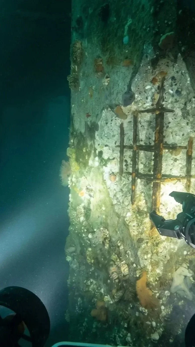 Underwater ROV inspection image of a degraded pilar by DeepSky IQ showing the rusted metal structure on the ocean floor.