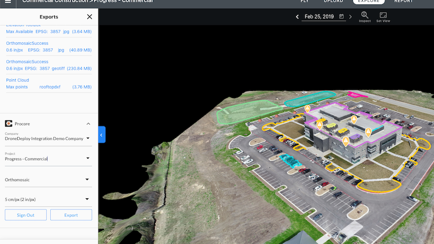 A 3D drone map of a commercial building including parking lot, landscape, and surrounding land, with marked areas and pointing icons.