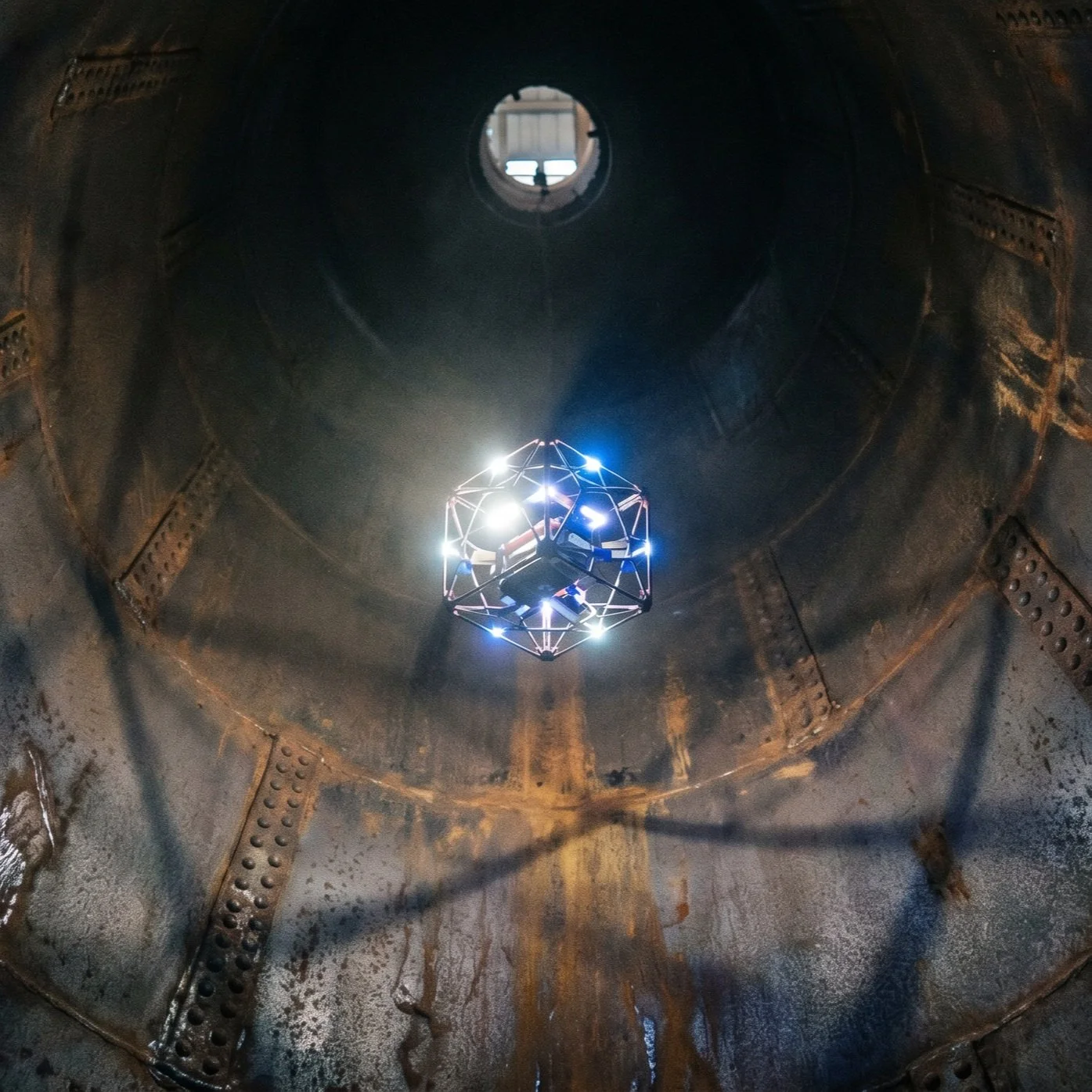 A confined space drone scanning the inside of a tank for defect mapping by DeepSky IQ