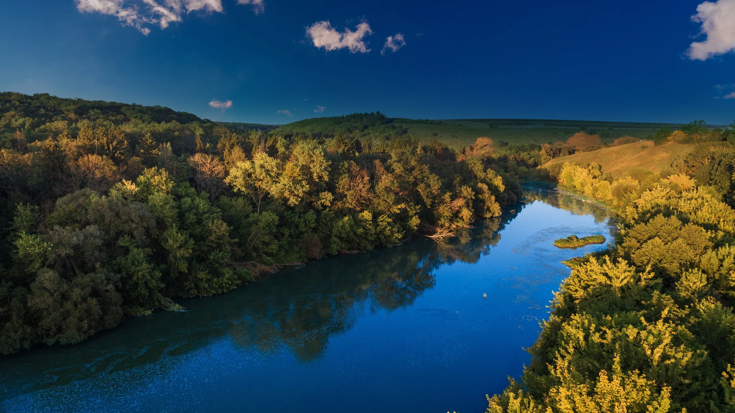 Environmental & Conservation page link showing a river inspection by deepsky iq