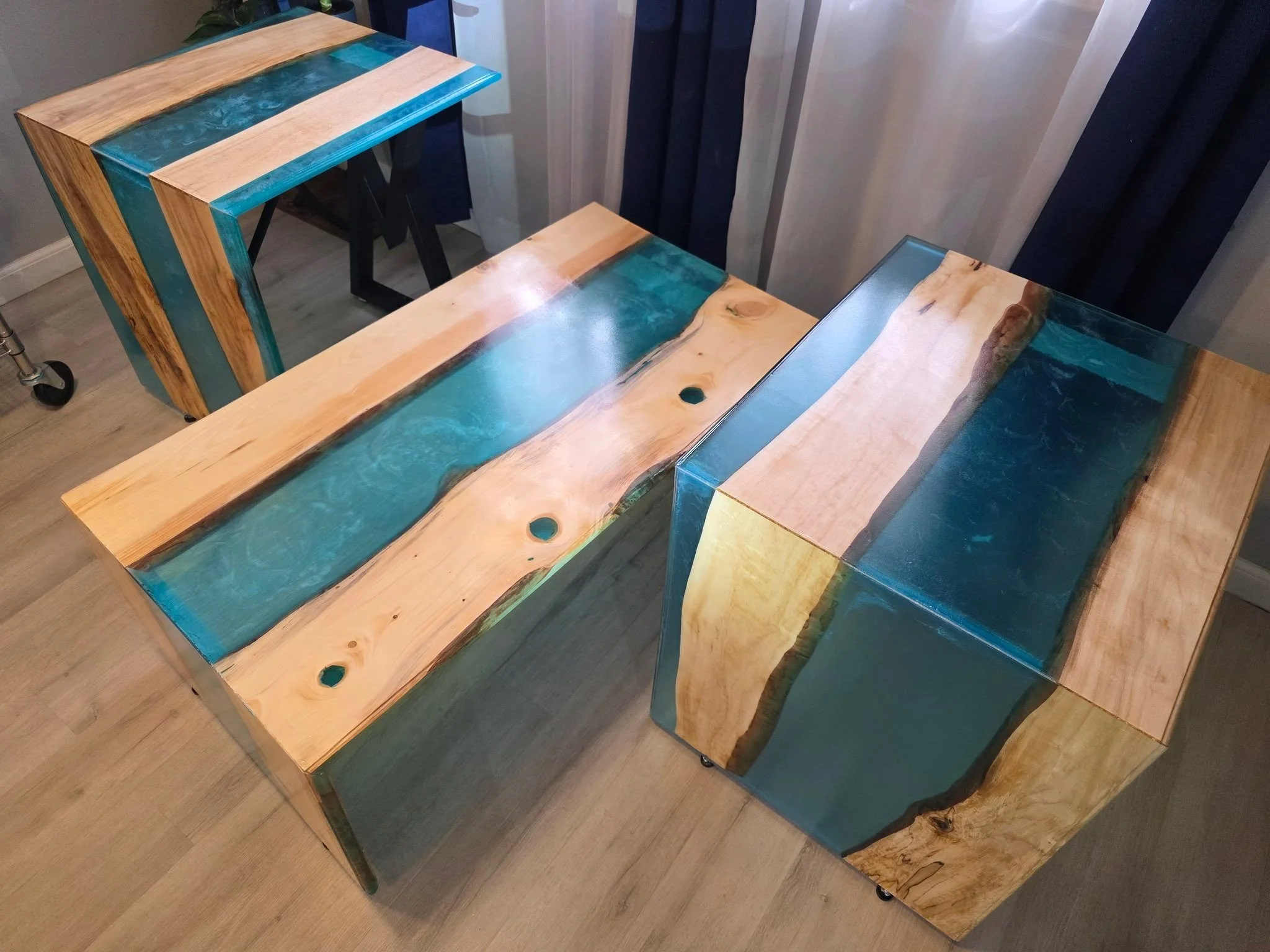 From the first pour of teal resin to the final polish, I kept picturing this set in my client&rsquo;s home. The movement in the river, the natural grain, the waterfall edges &mdash; every detail mattered.

When you handcraft something from raw wood a
