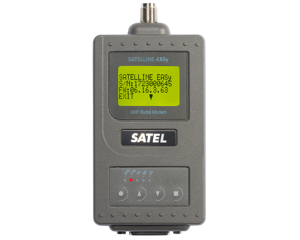 A gray satellite communication device with a small screen displaying information, labeled SATEL, and a row of buttons below the screen.