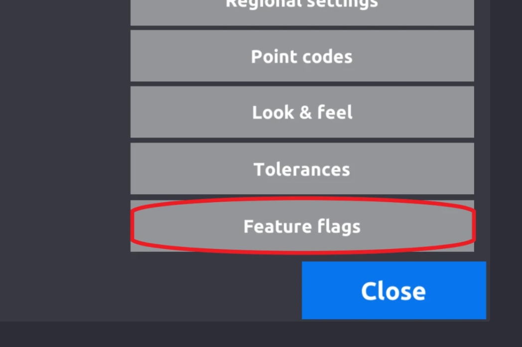 A digital settings menu showing options for regional settings, point codes, look & feel, tolerances, and feature flags, with the Feature Flags option highlighted with a red oval. A blue Close button is visible at the bottom.