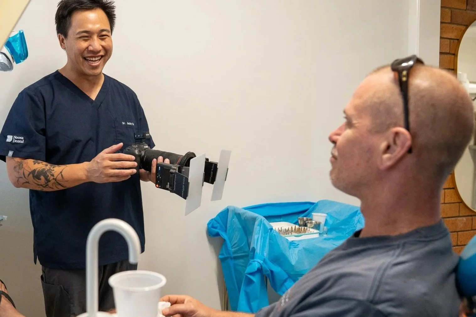 Woman taking a selfie, winking and smiling.