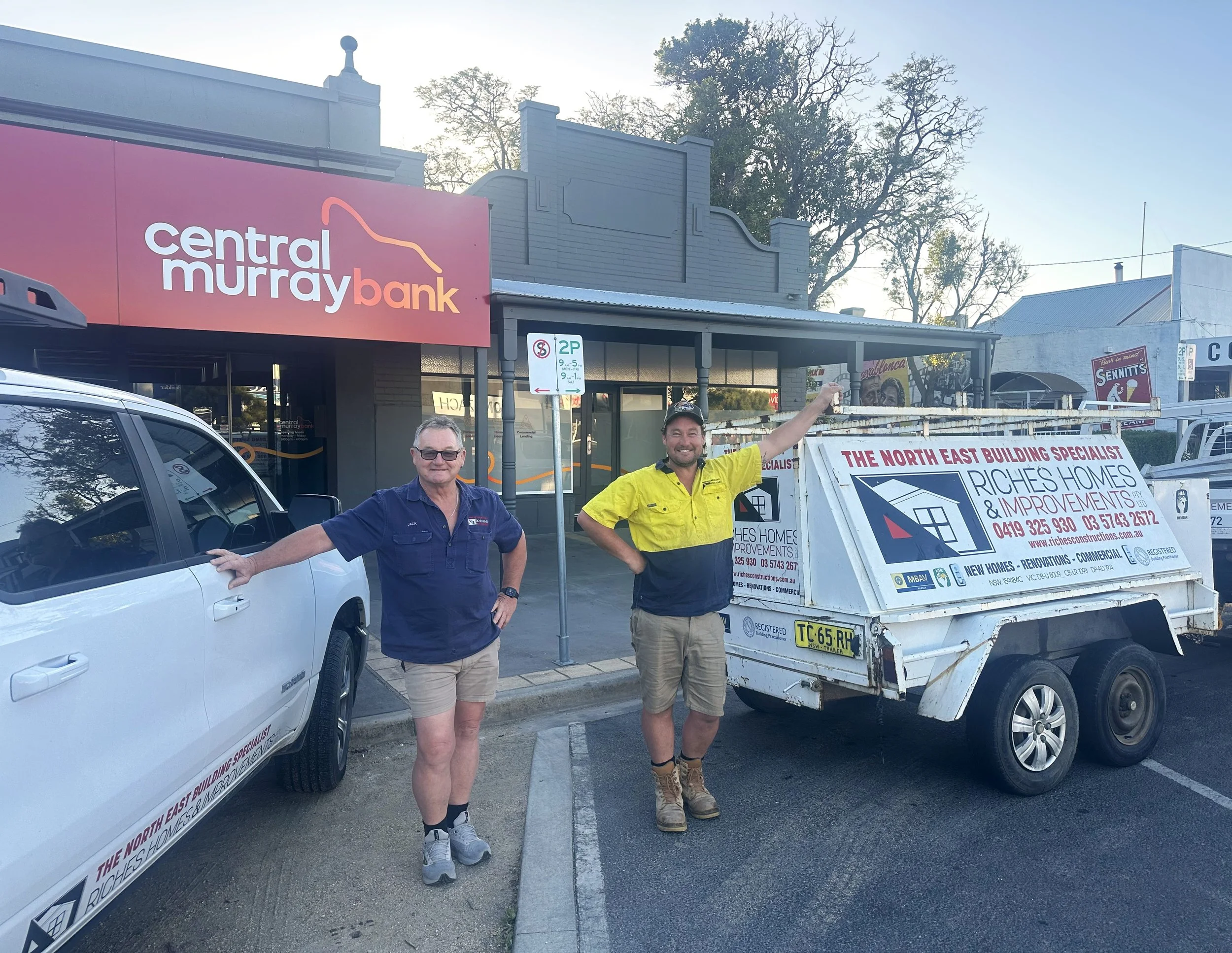 Jack and Josh Riches standing in front of Central Murray Bank in Belmore St Yarrawonga. Recently renovated by Riches Homes & Improvements in Australia.