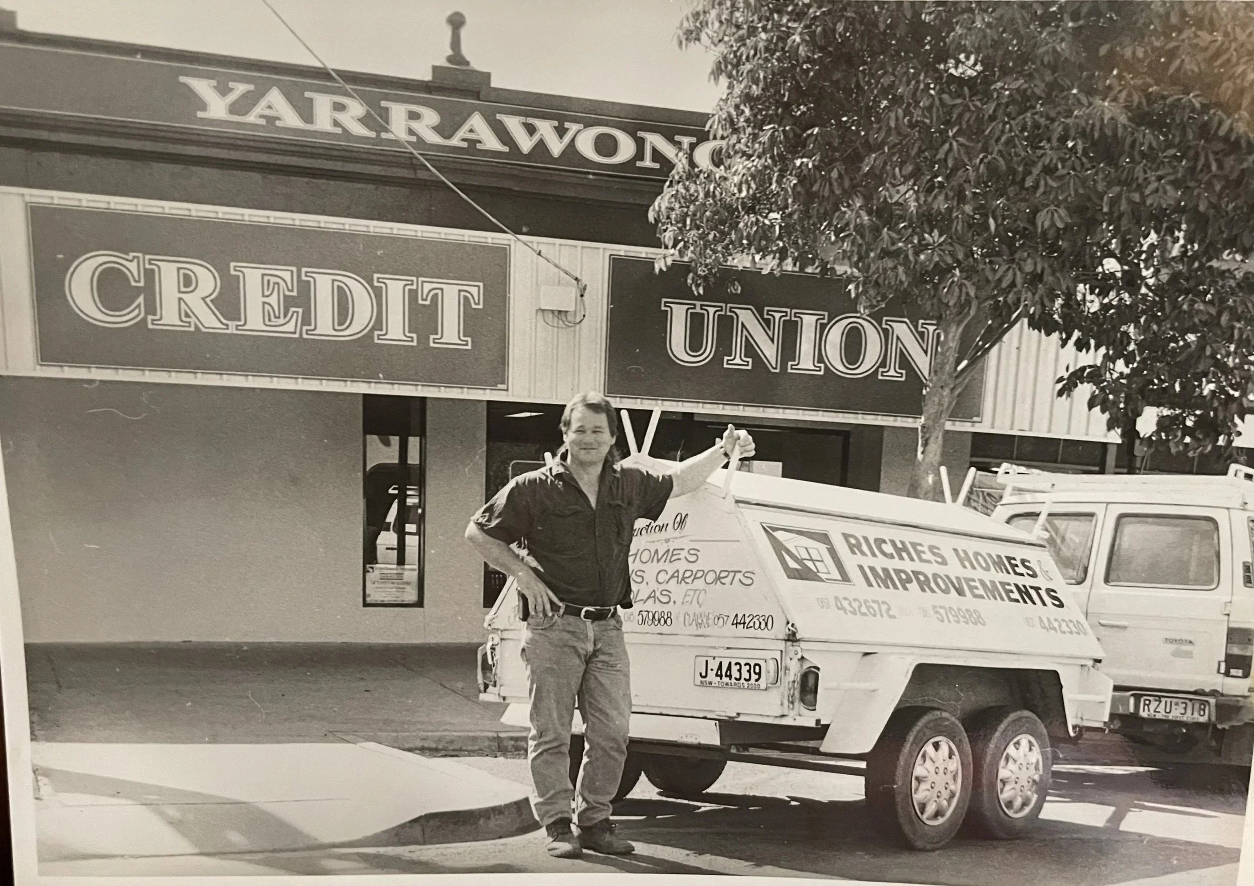 Jack Riches standing in front of Central Murray Credit Union after the first renovation carried out by Riches Homes & Improvements.