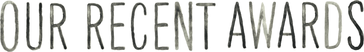 Text on a black background that reads "OUR RECENT AWARDS" in large, gray letters.